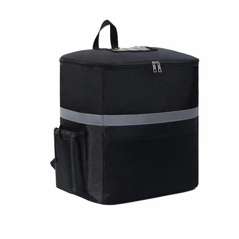 Black insulated picnic cooler bag with zip closure, carry handle and side pocket
