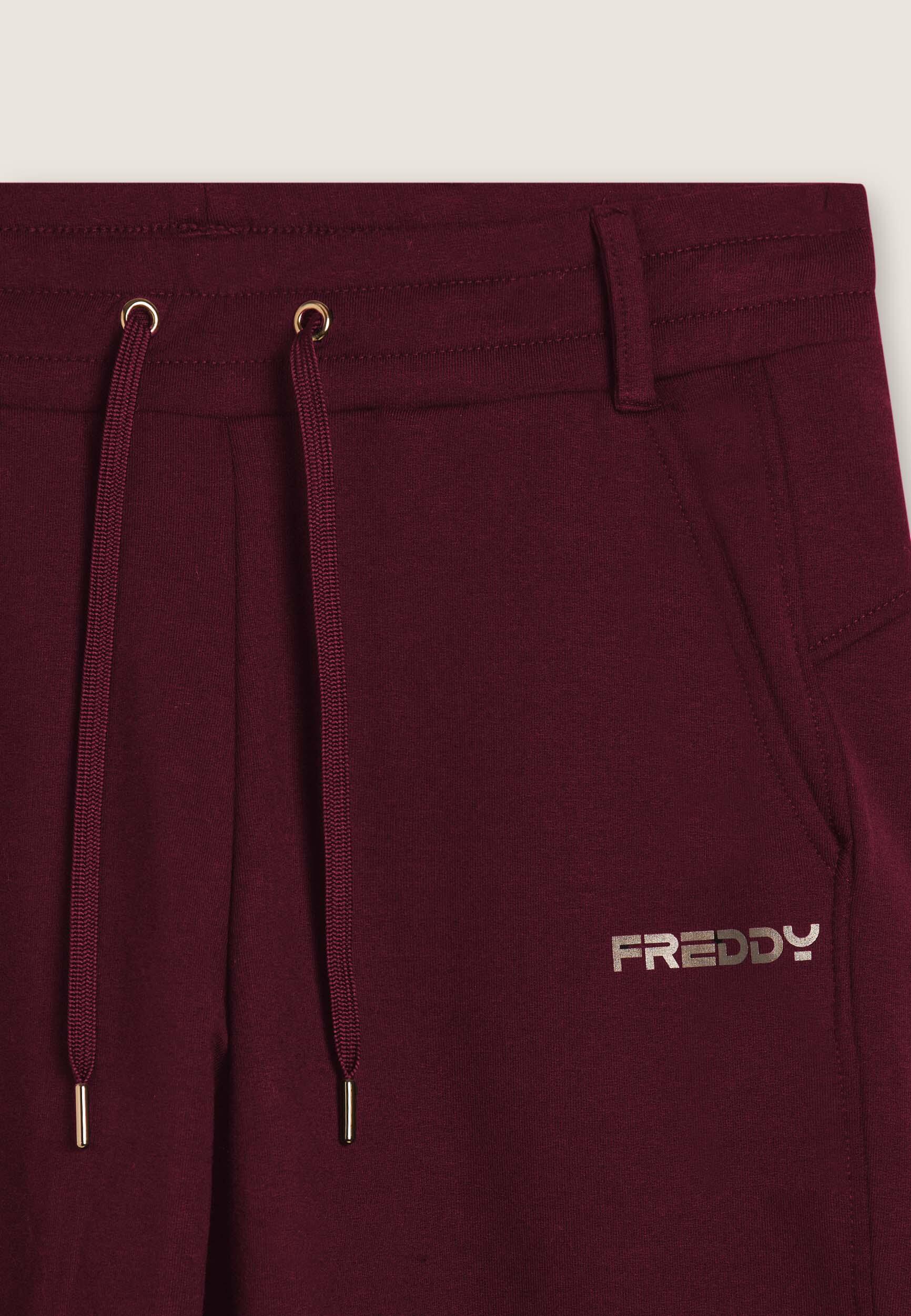 Pantaloni slim fit con spacchi laterali 3/3