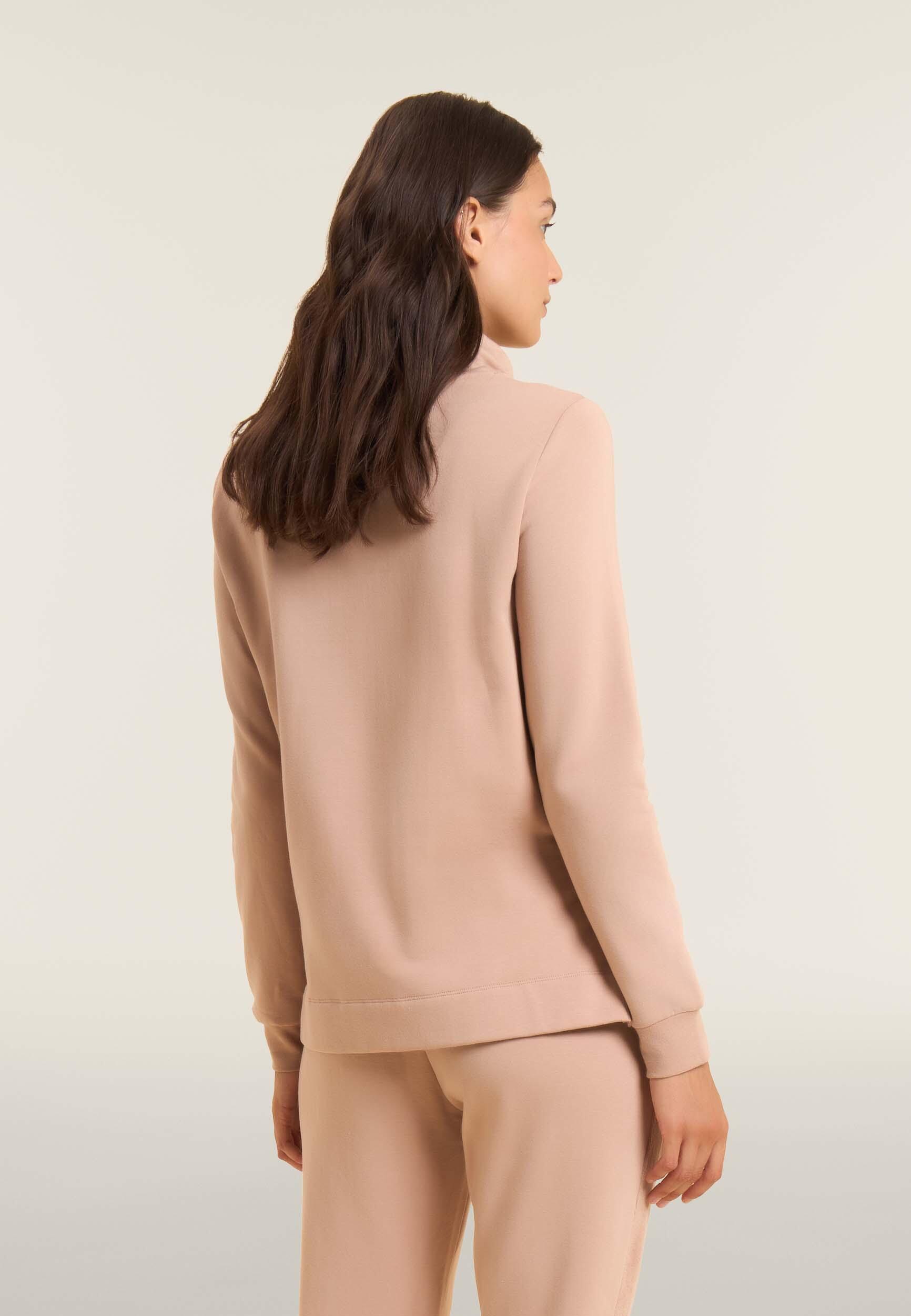 Felpa sportiva da donna con spacchi laterali e logo frontale 3/4