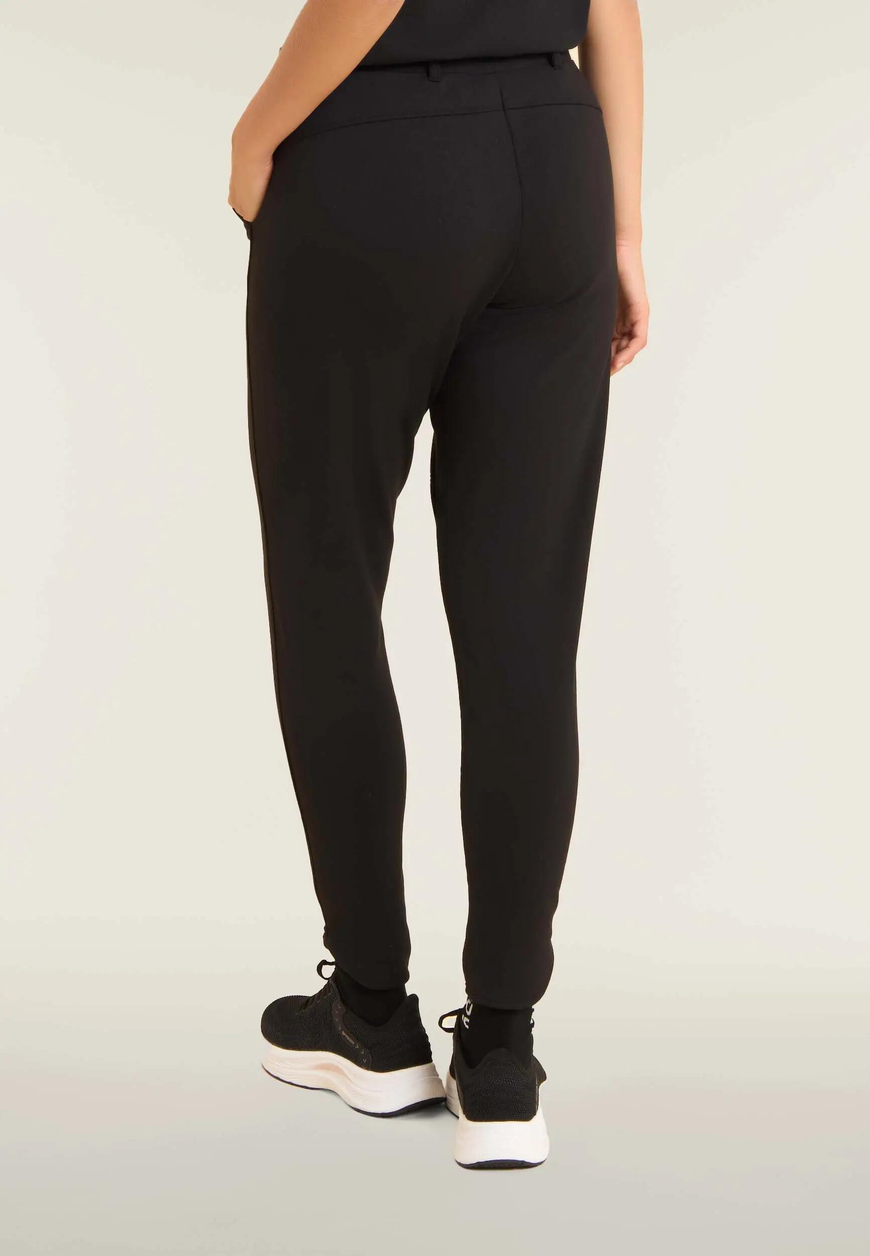 Pantalón slim fit con aberturas laterales 3/6