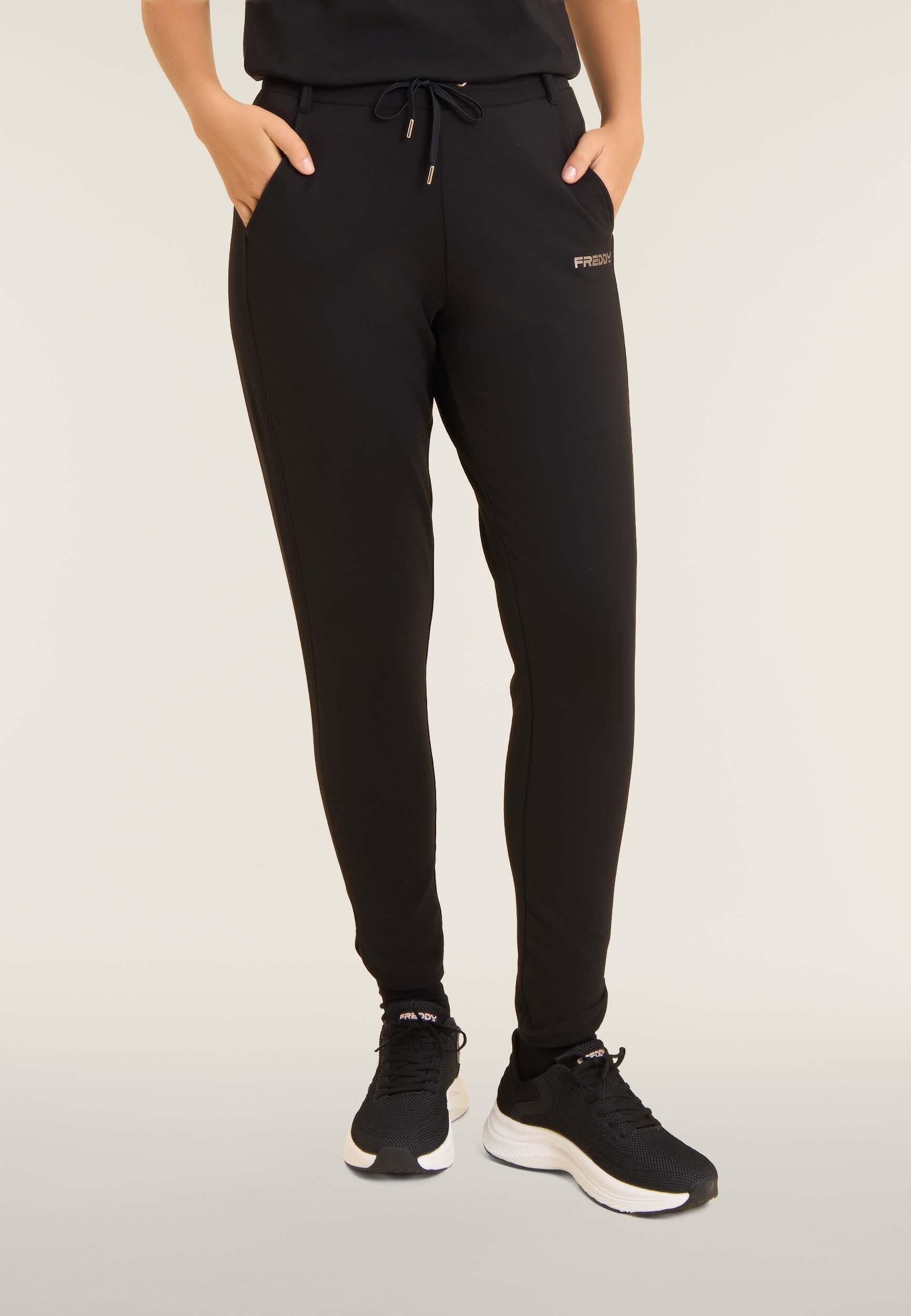 Pantaloni slim fit con spacchi laterali 2/4