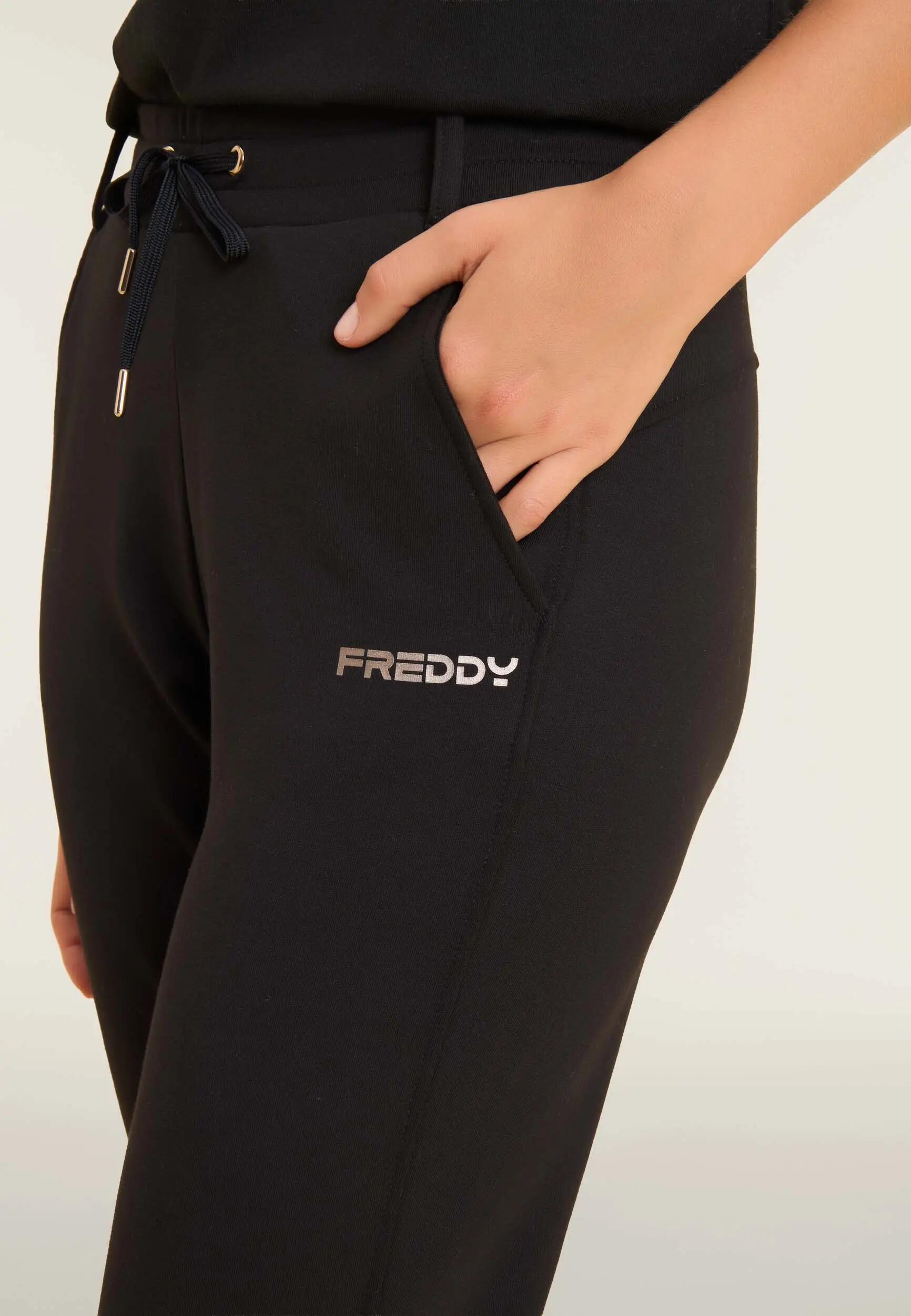 Pantalón slim fit con aberturas laterales 4/6