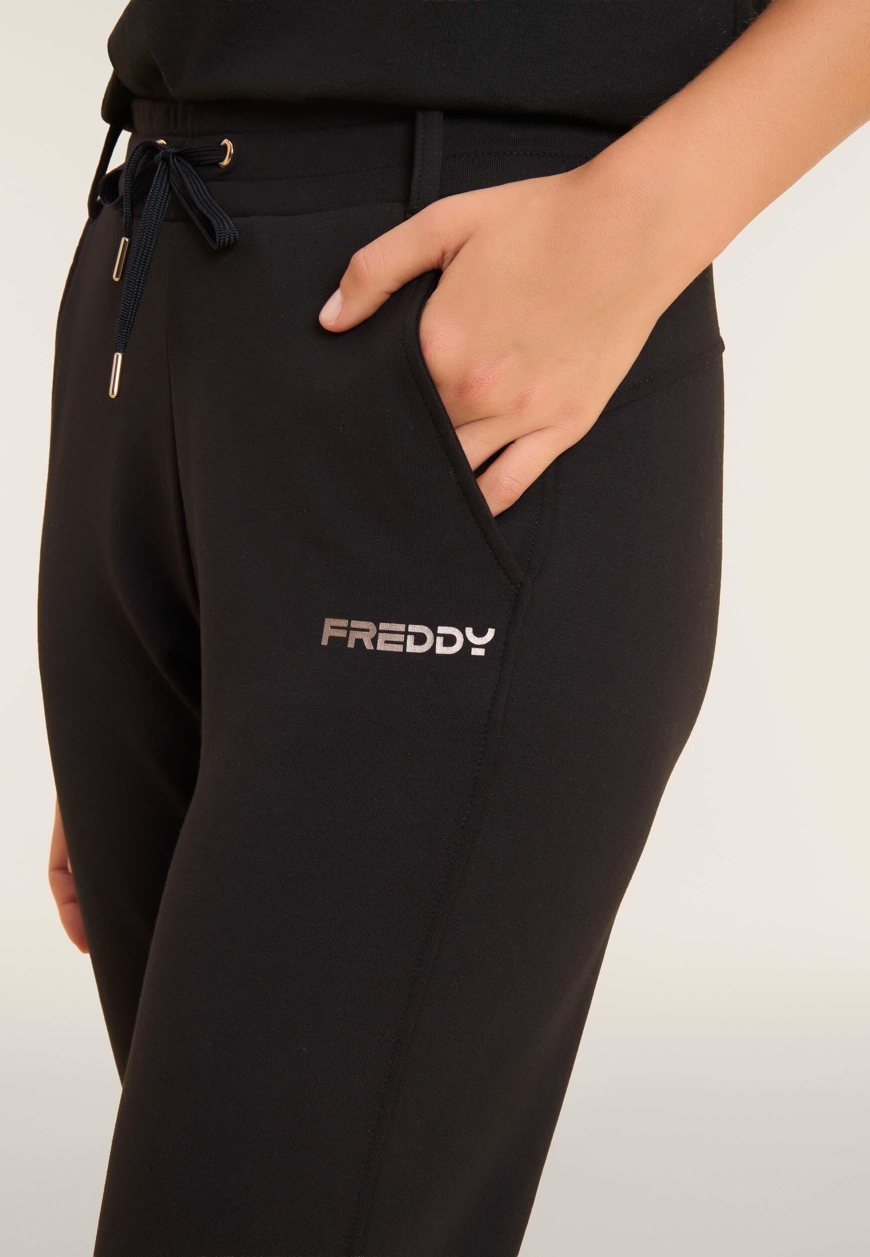 Pantaloni slim fit con spacchi laterali 4/4