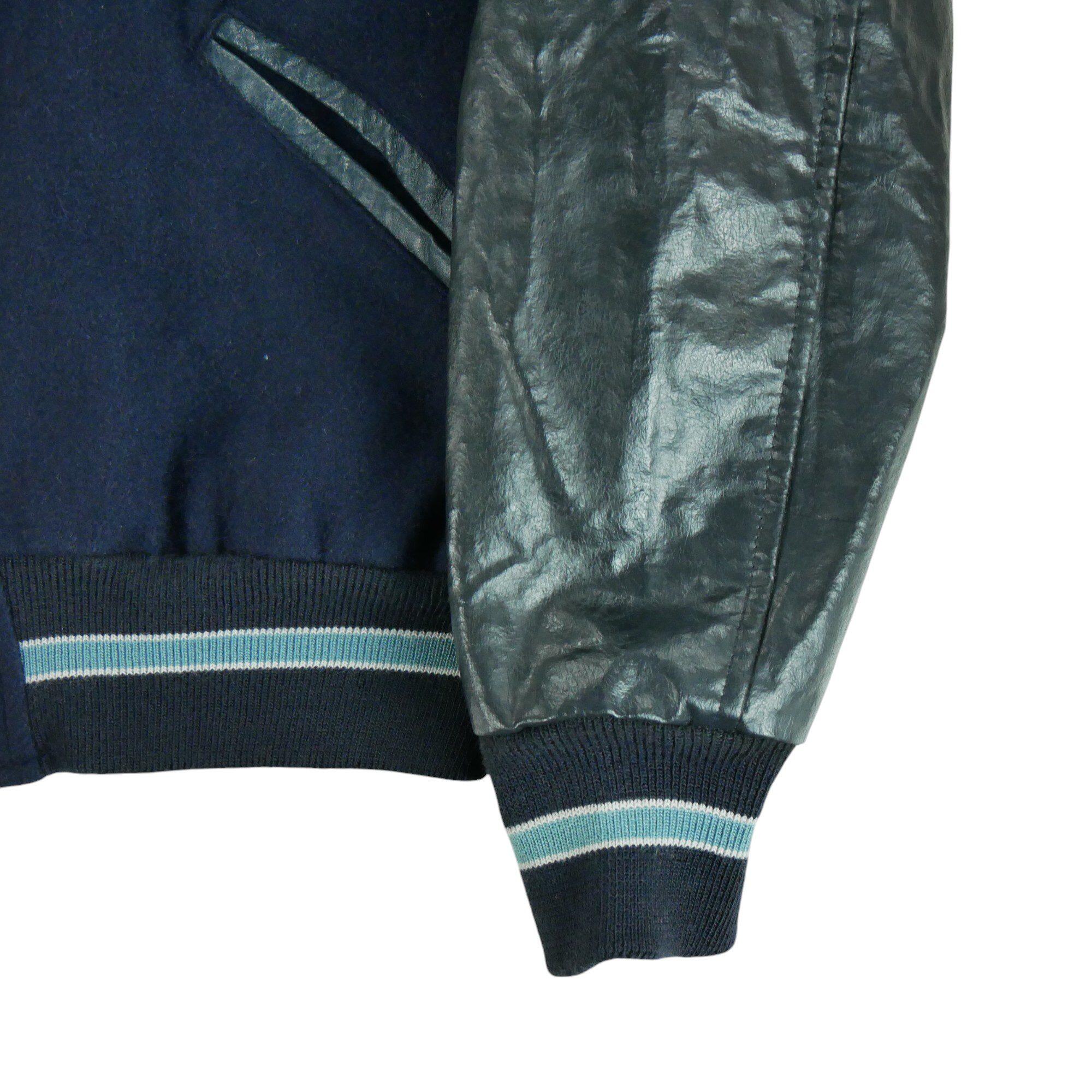 Segunda Vida - Casaco Masculina NCAA Vintage Tar Heels - Em muito bom estado 5/6