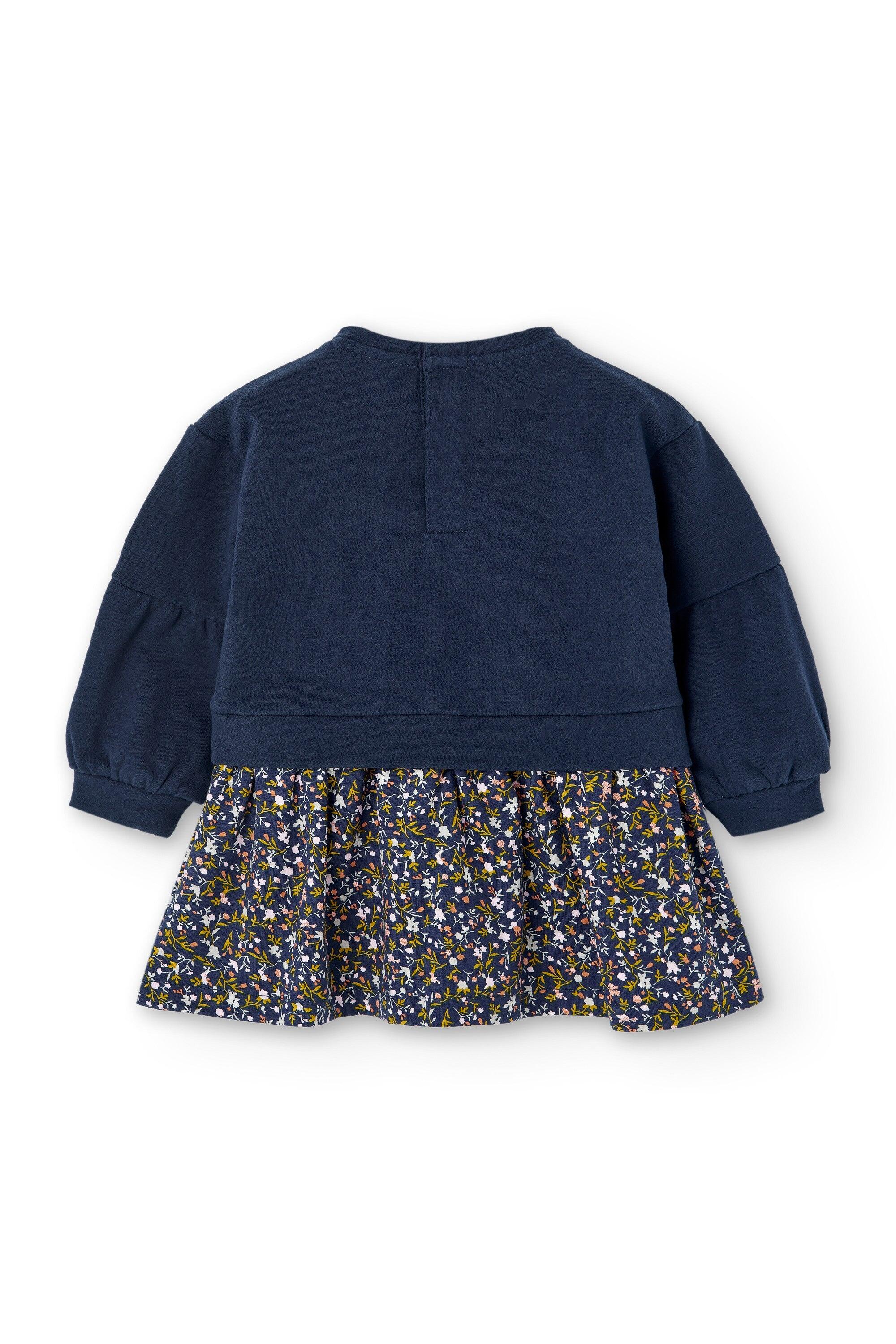 Vestido infantil azul marinho com estampa floral. 2/5