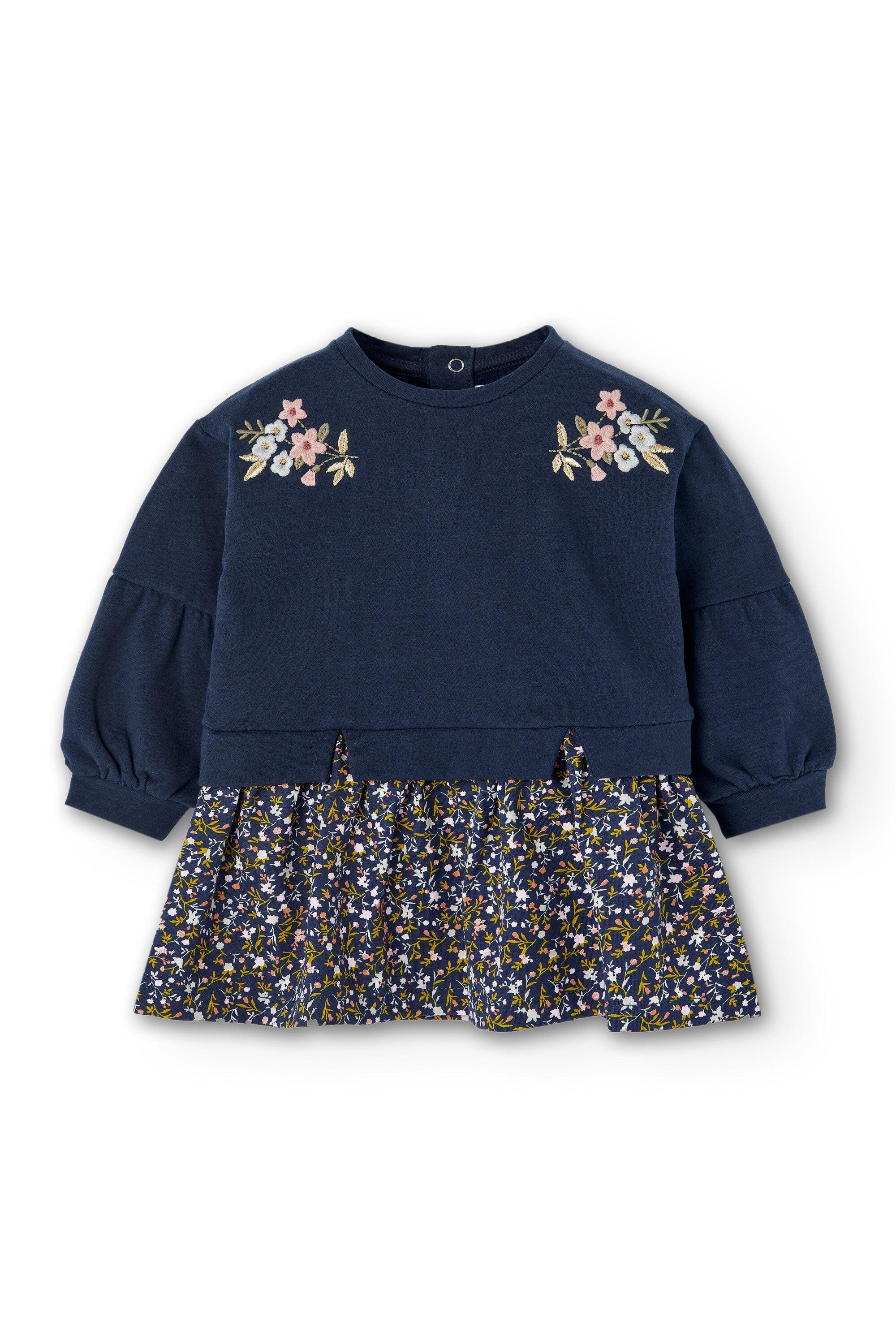 Vestido infantil azul marinho com estampa floral. 4/5