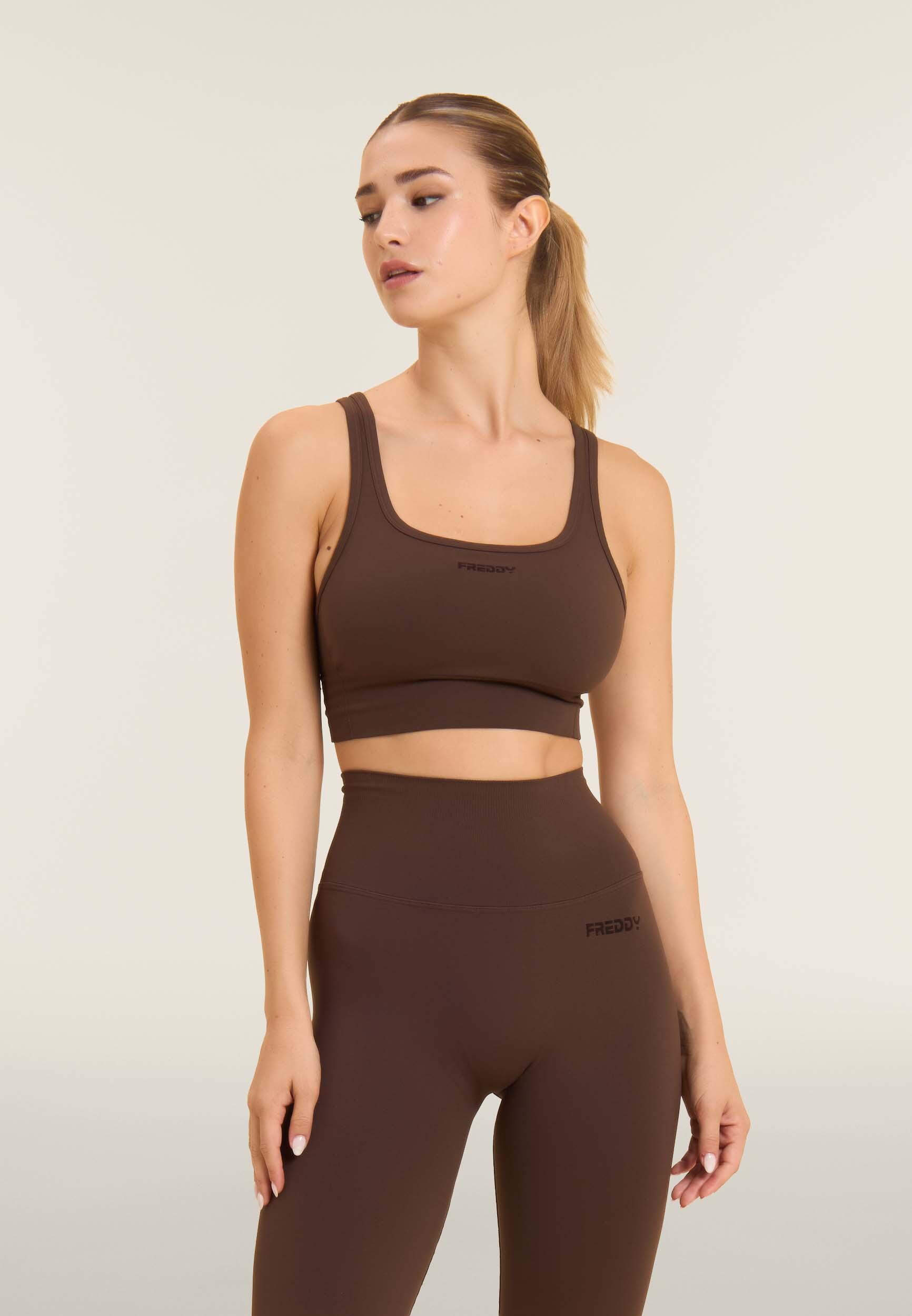 Top sportivo seamless supporto medio con inserti a costine 2/6