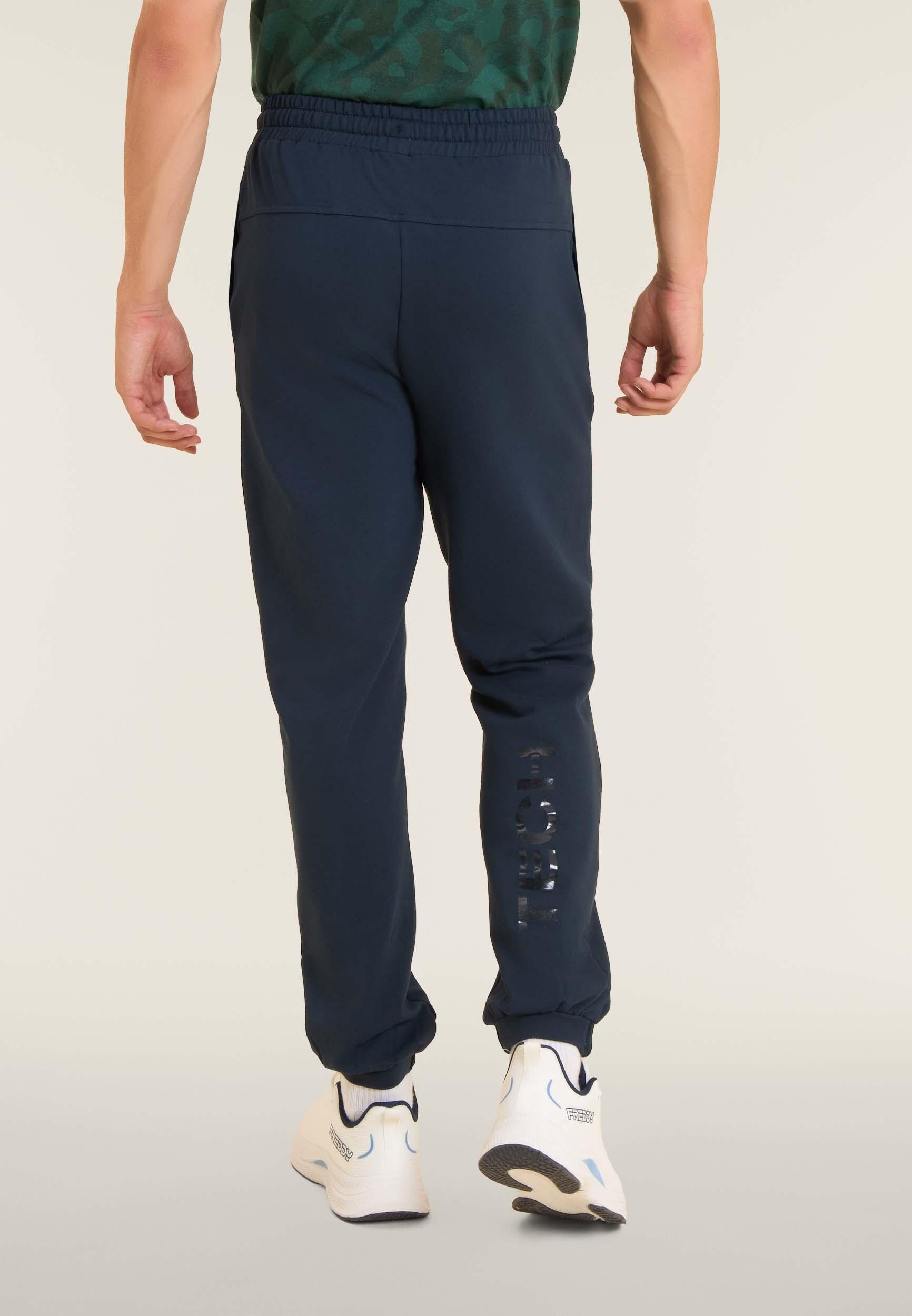 Pantaloni regular in felpa con stampa lucida e cuciture 3/4