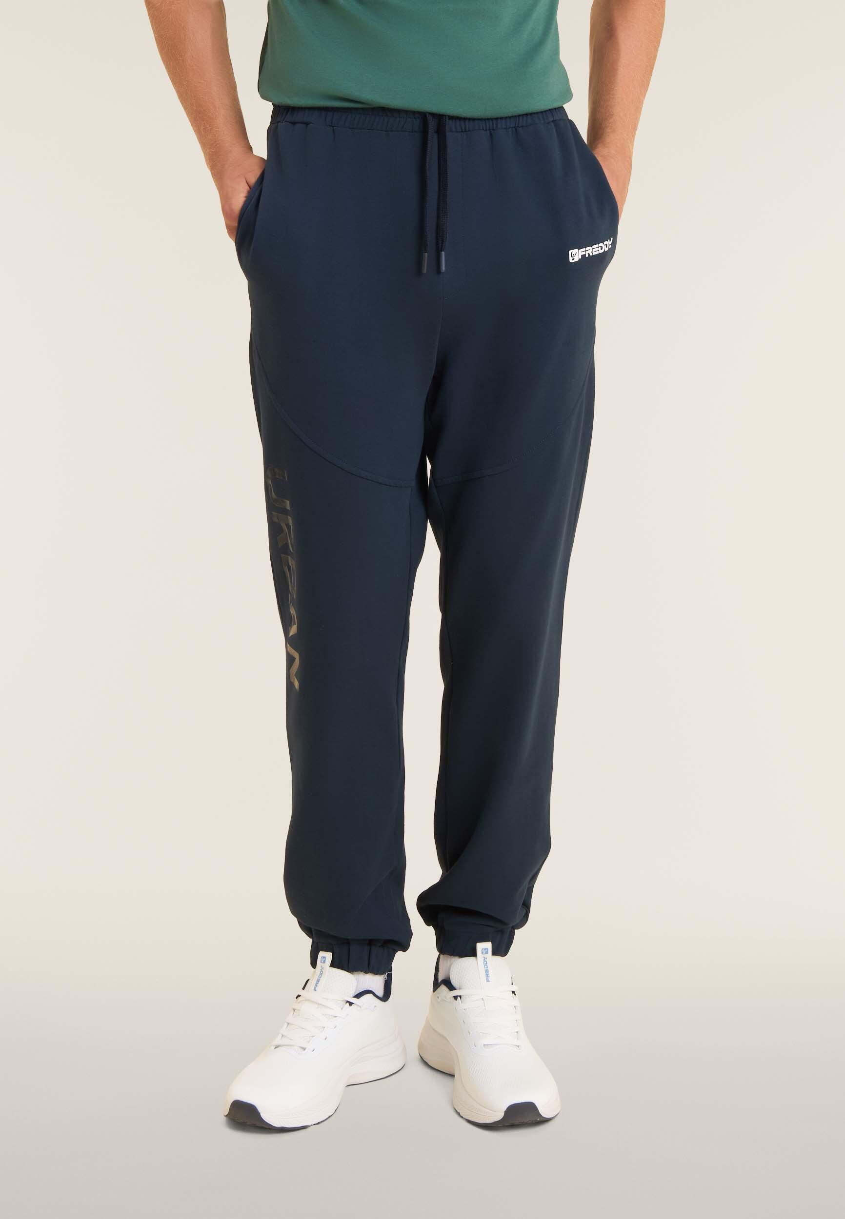 Pantaloni regular in felpa con stampa lucida e cuciture 2/4