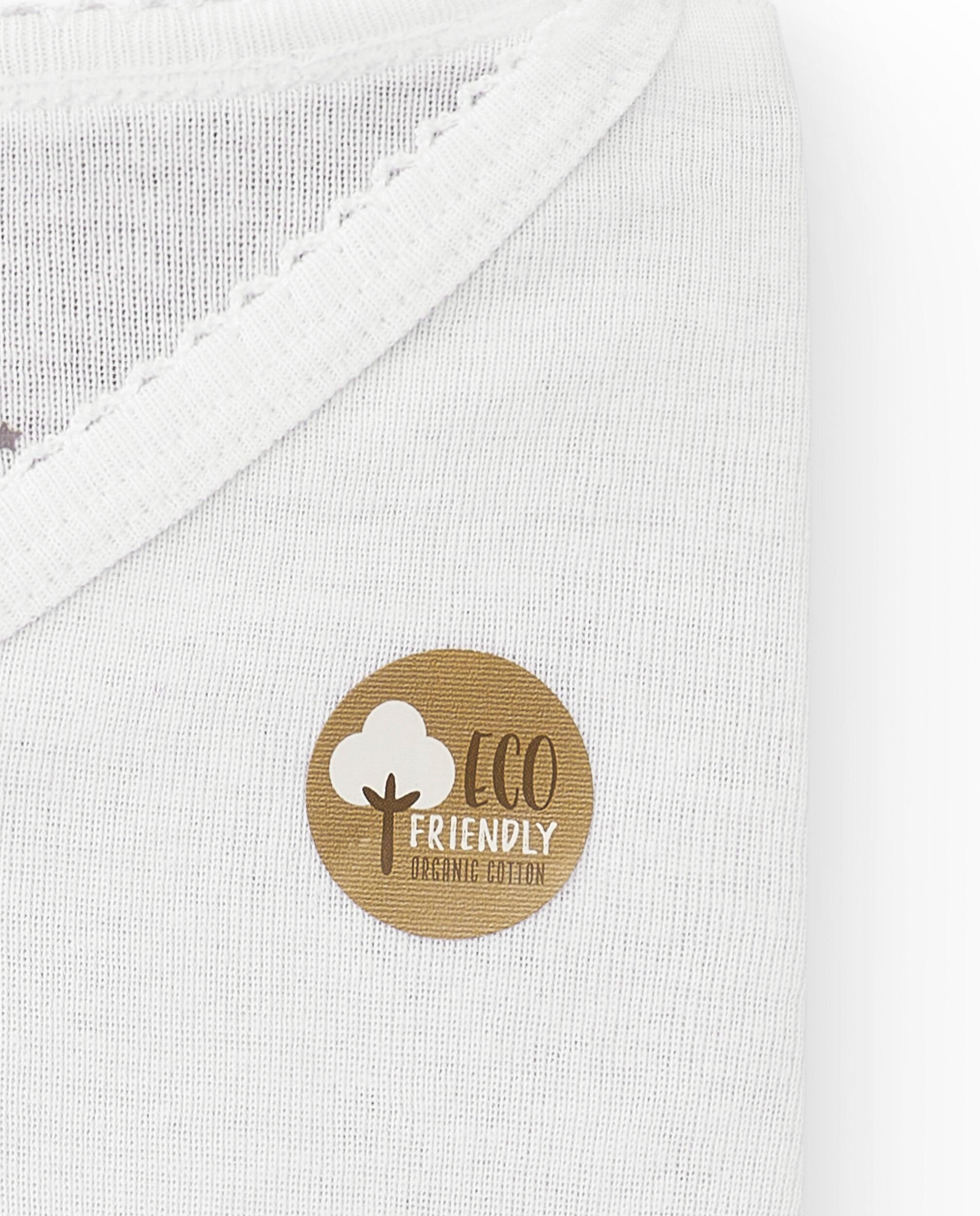 Camiseta interior de niña en algodón orgánico con cuello pico 2/4