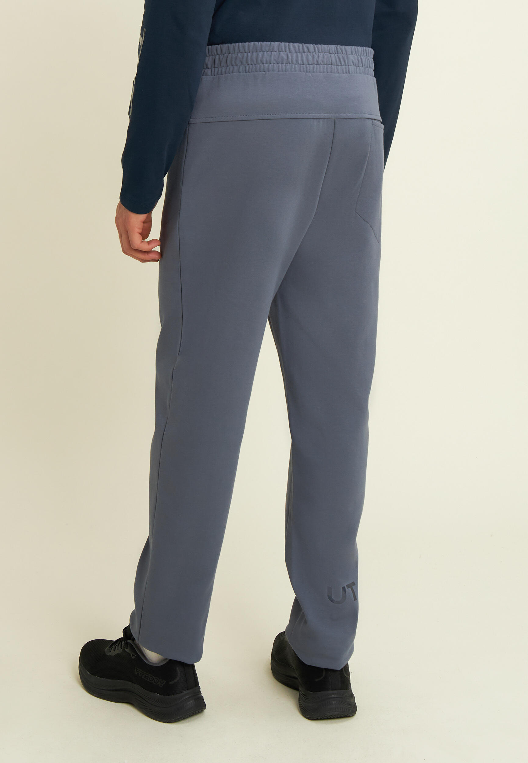 Pantaloni slim in interlock con dettagli lucidi 3/4