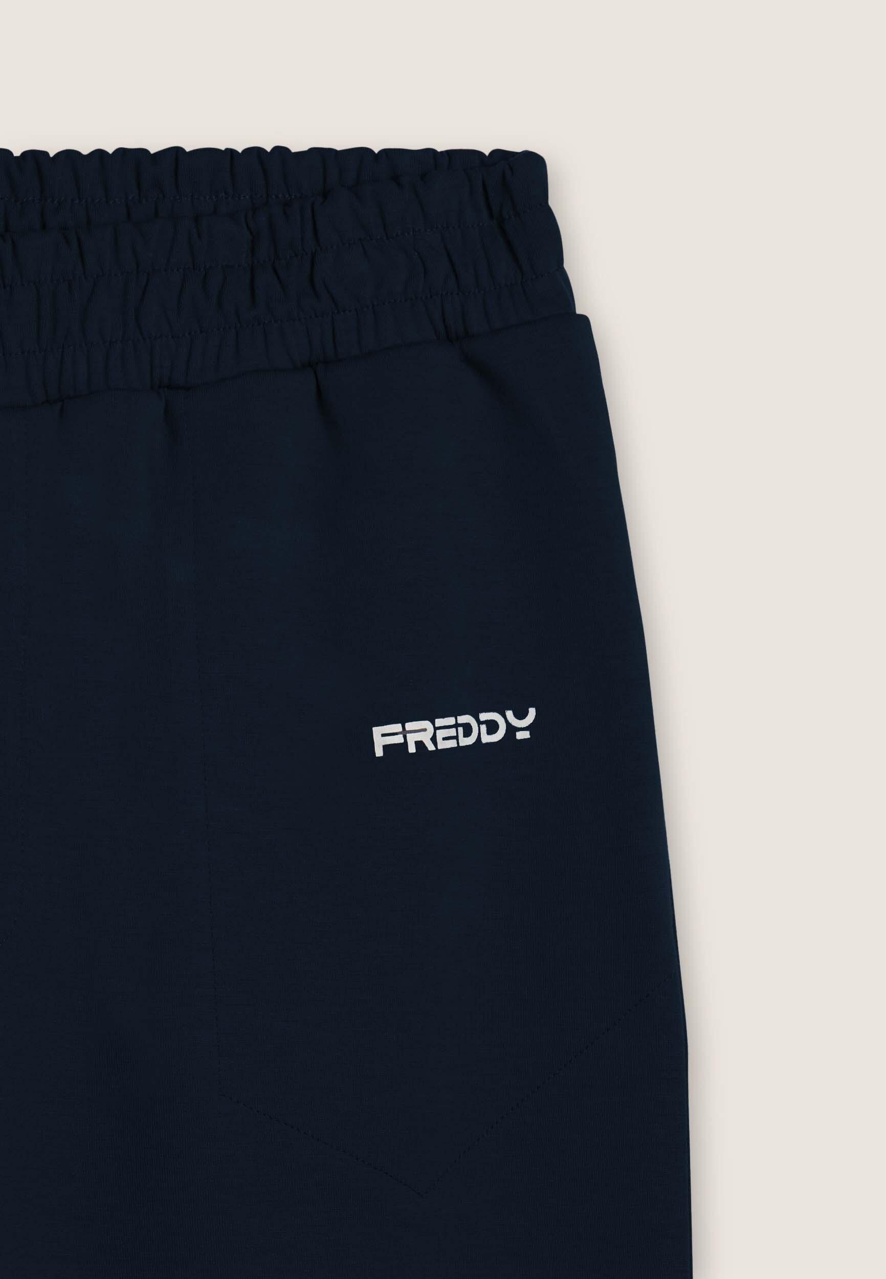 Pantaloni slim in interlock con dettagli lucidi 3/3