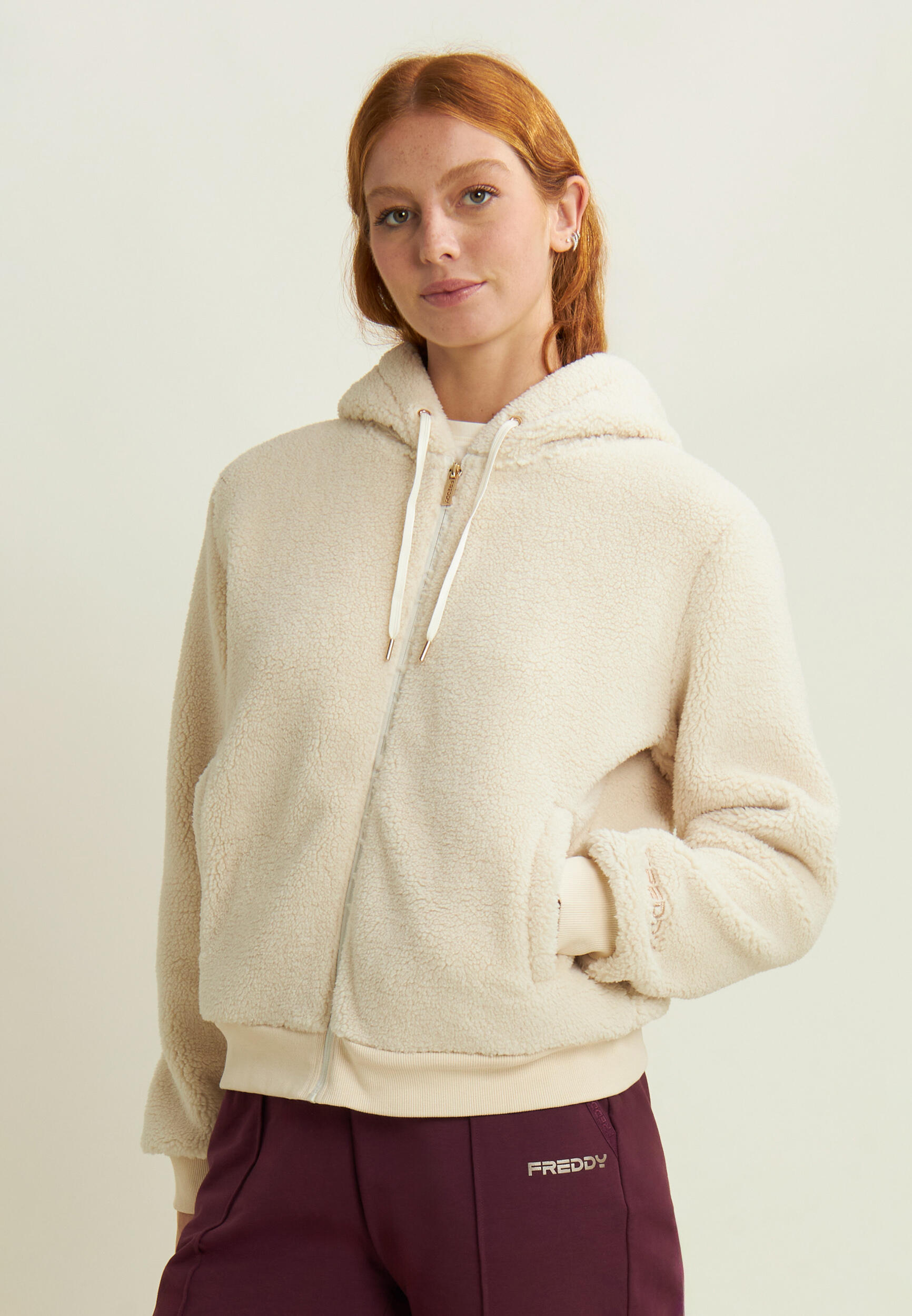 Giacca da donna in pile sherpa con cappuccio e zip 2/5