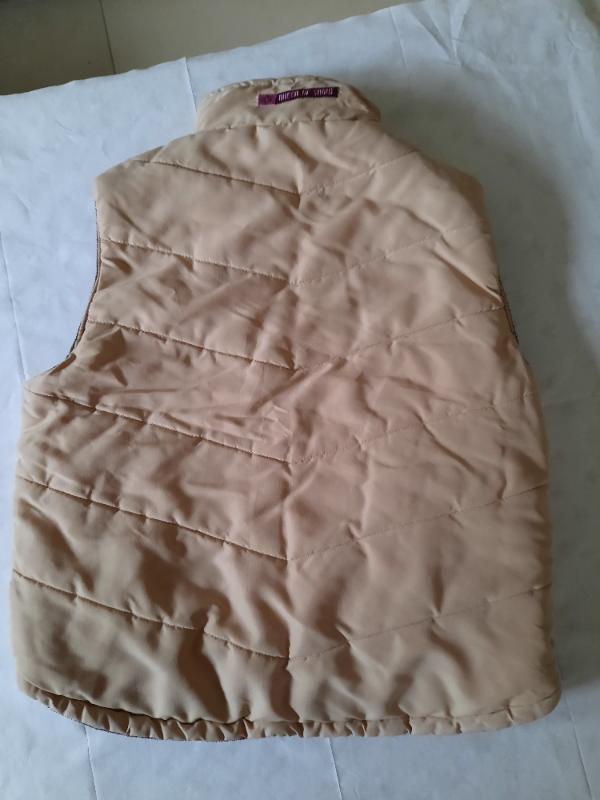 Tussen Particulieren - Omkeerbare warme bodywarmer 4/5