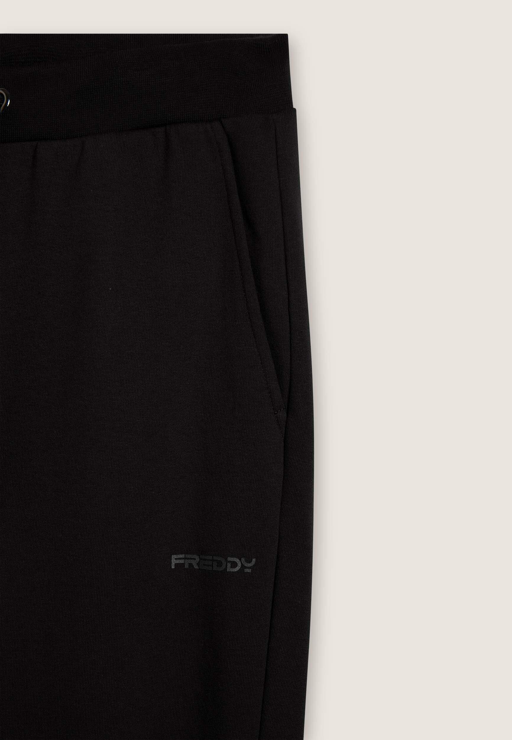 Pantaloni regular in felpa garzata con fondo in costina 3/3