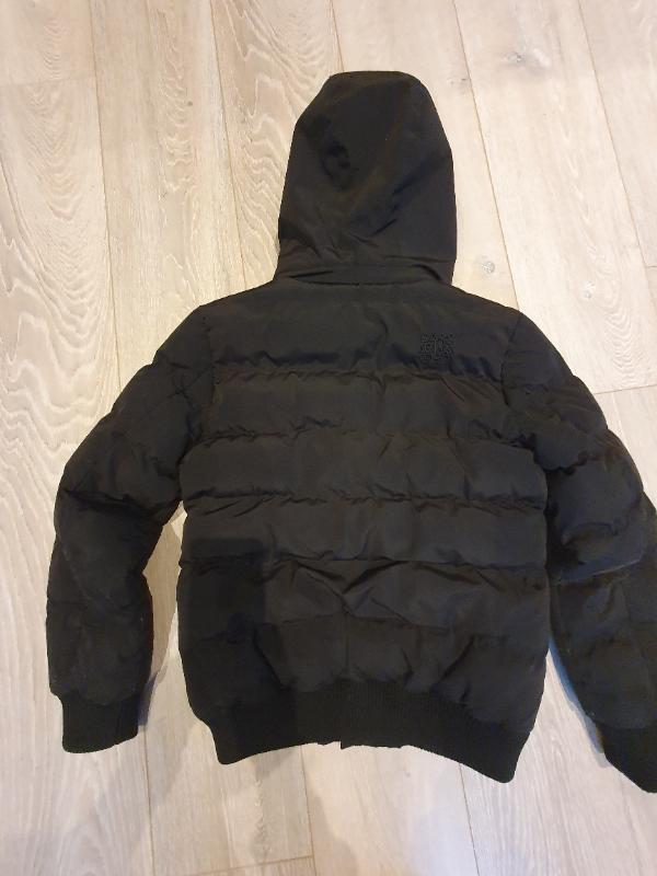Entre Particuliers - Doudoune d'hiver noir Cars taille 12 ans 3/3