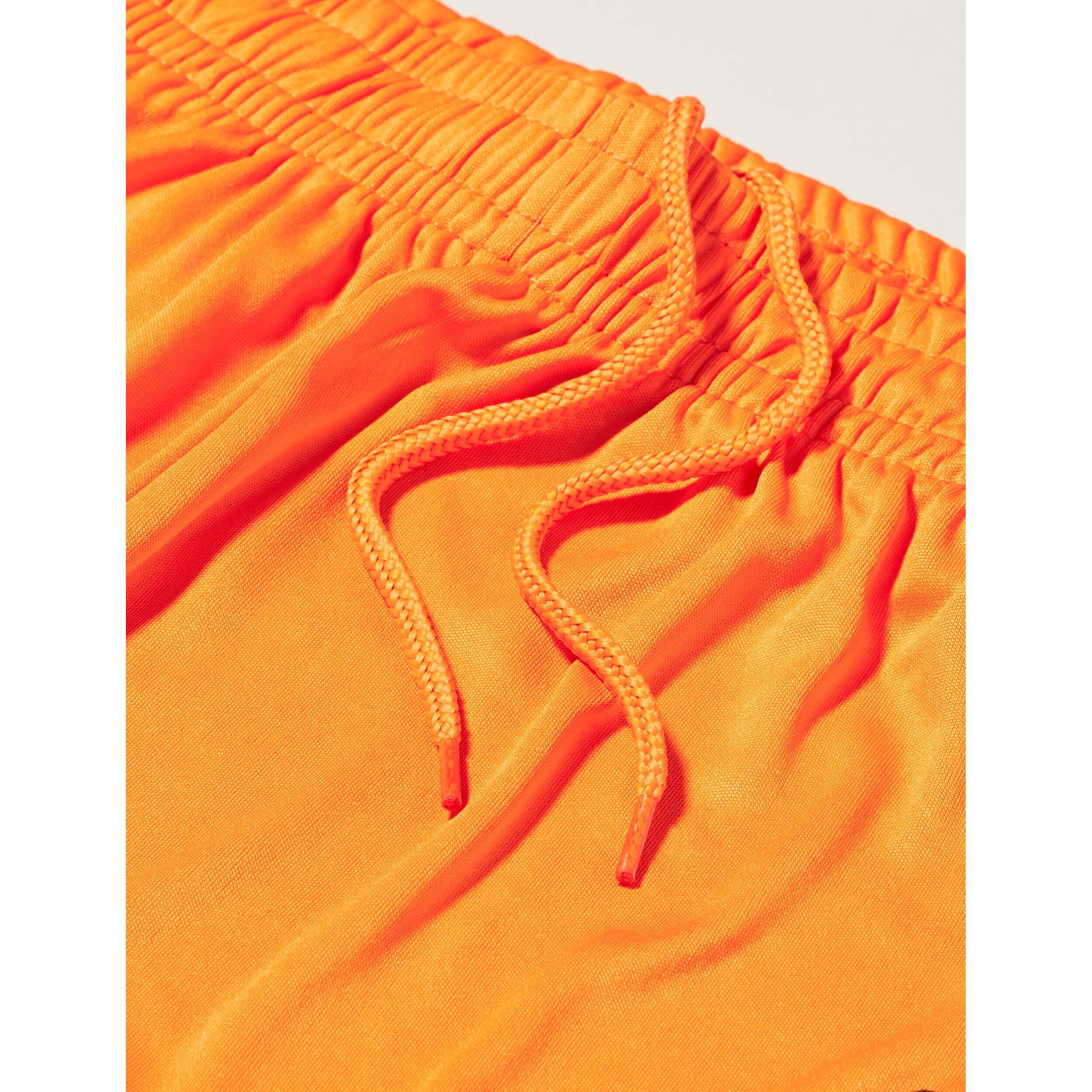 Pantaloncini sportivi da bambino in poliestere arancio da calcio 4/7