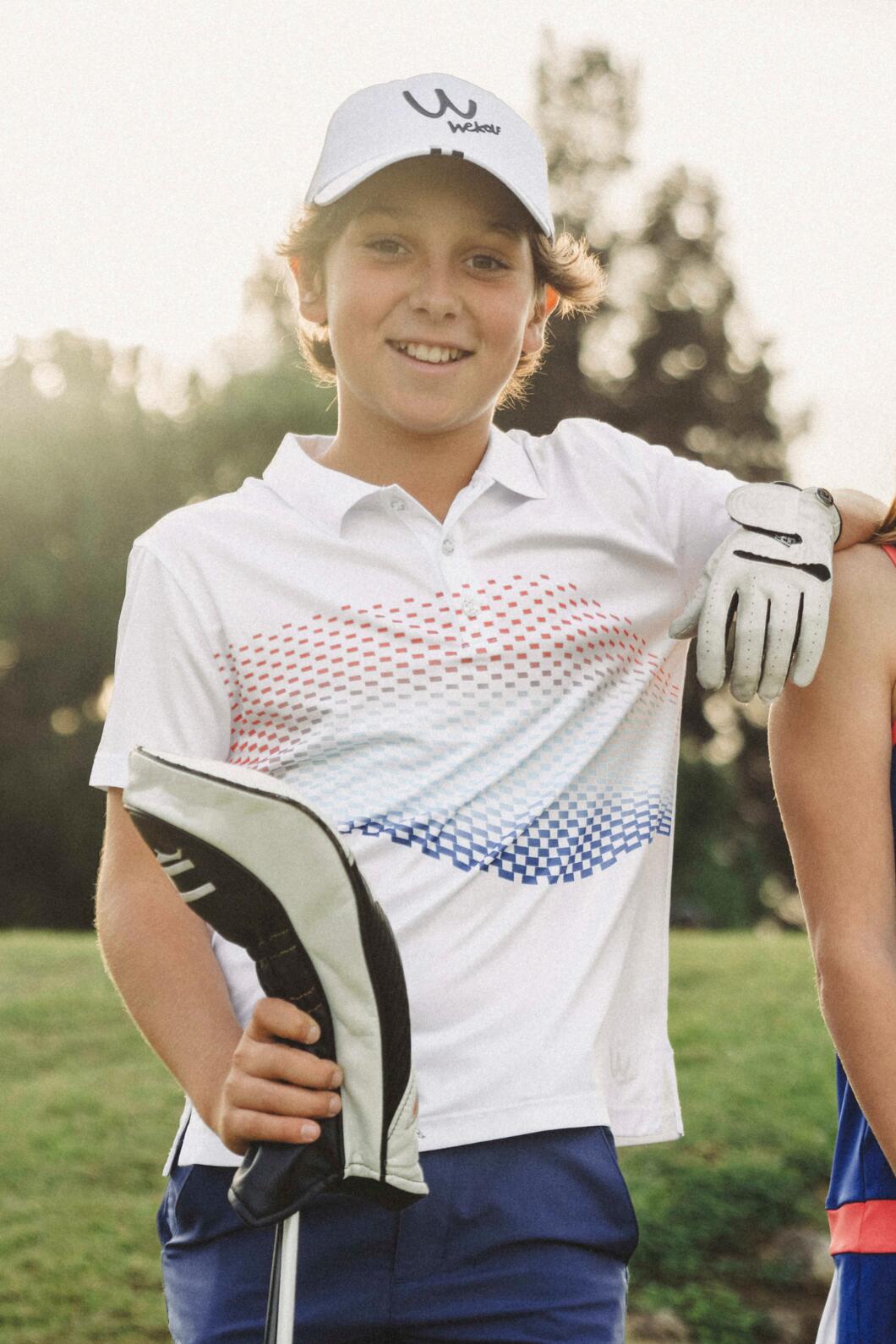 Witte golfpolo met geometrisch patroon voor jongens 3/4