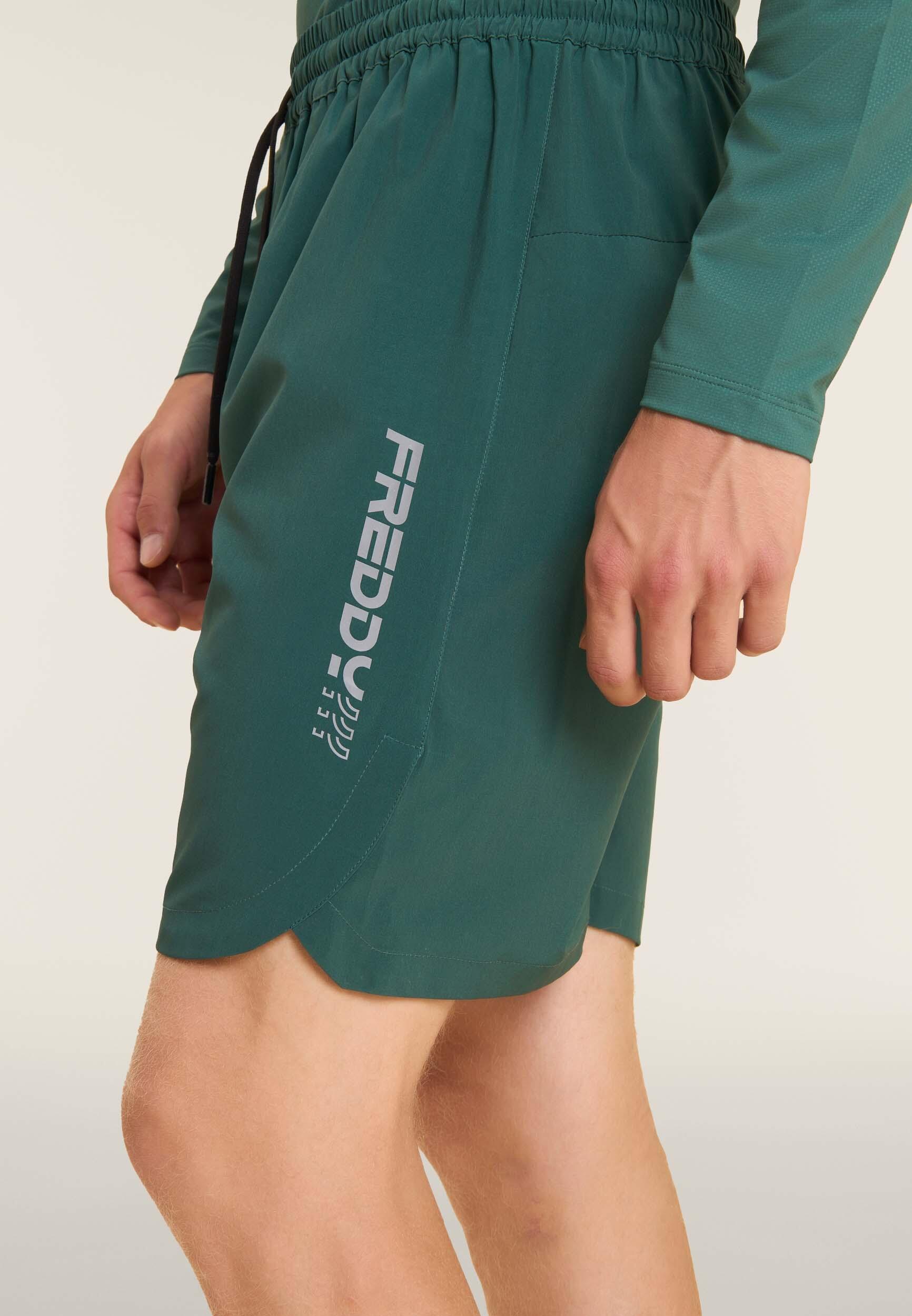 Pantalon court de coupe ajustée avec poches zippées et cordon à la taille 4/4