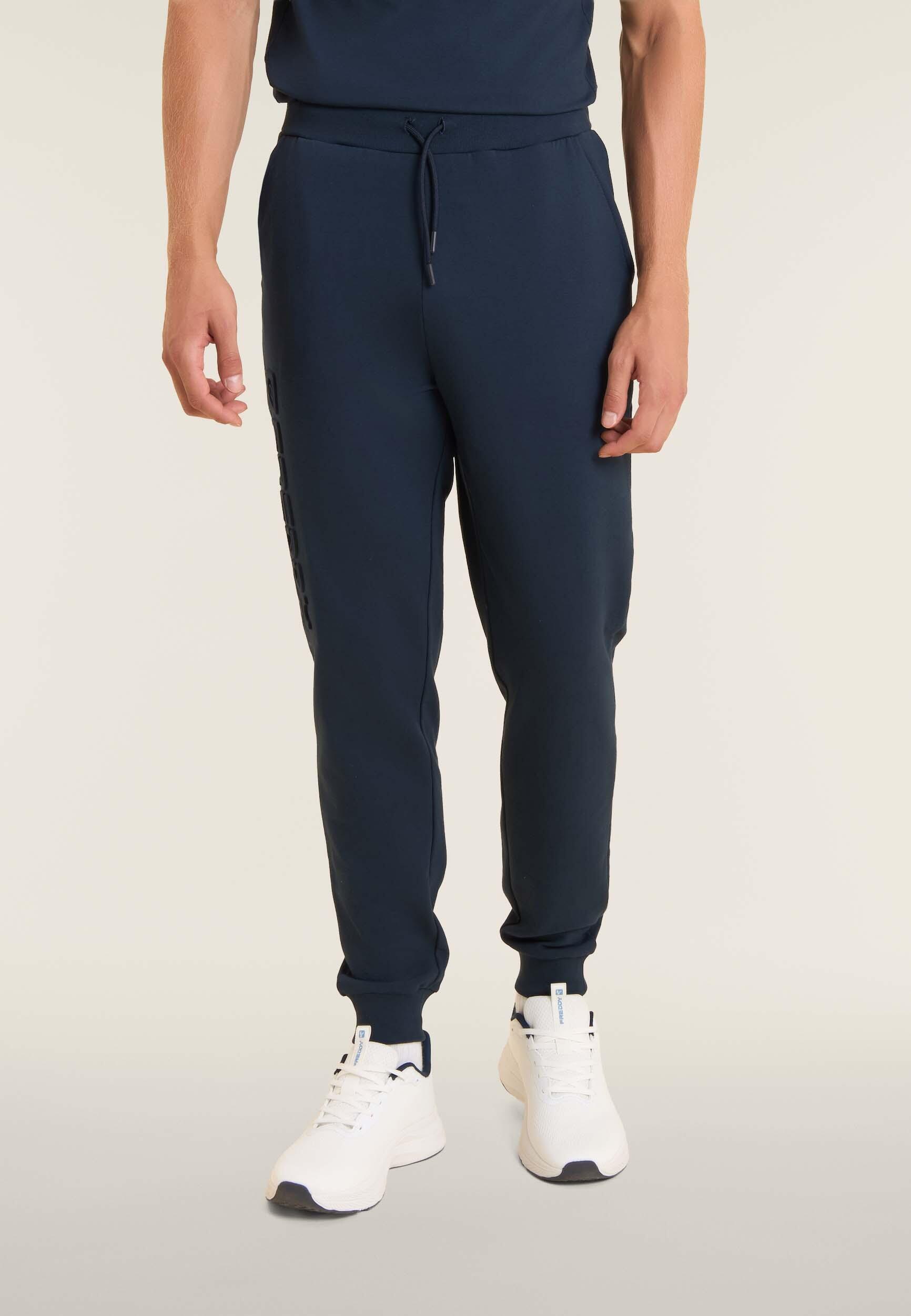 Pantalón slim en tejido interlock con maxilogotipo en relieve 2/4