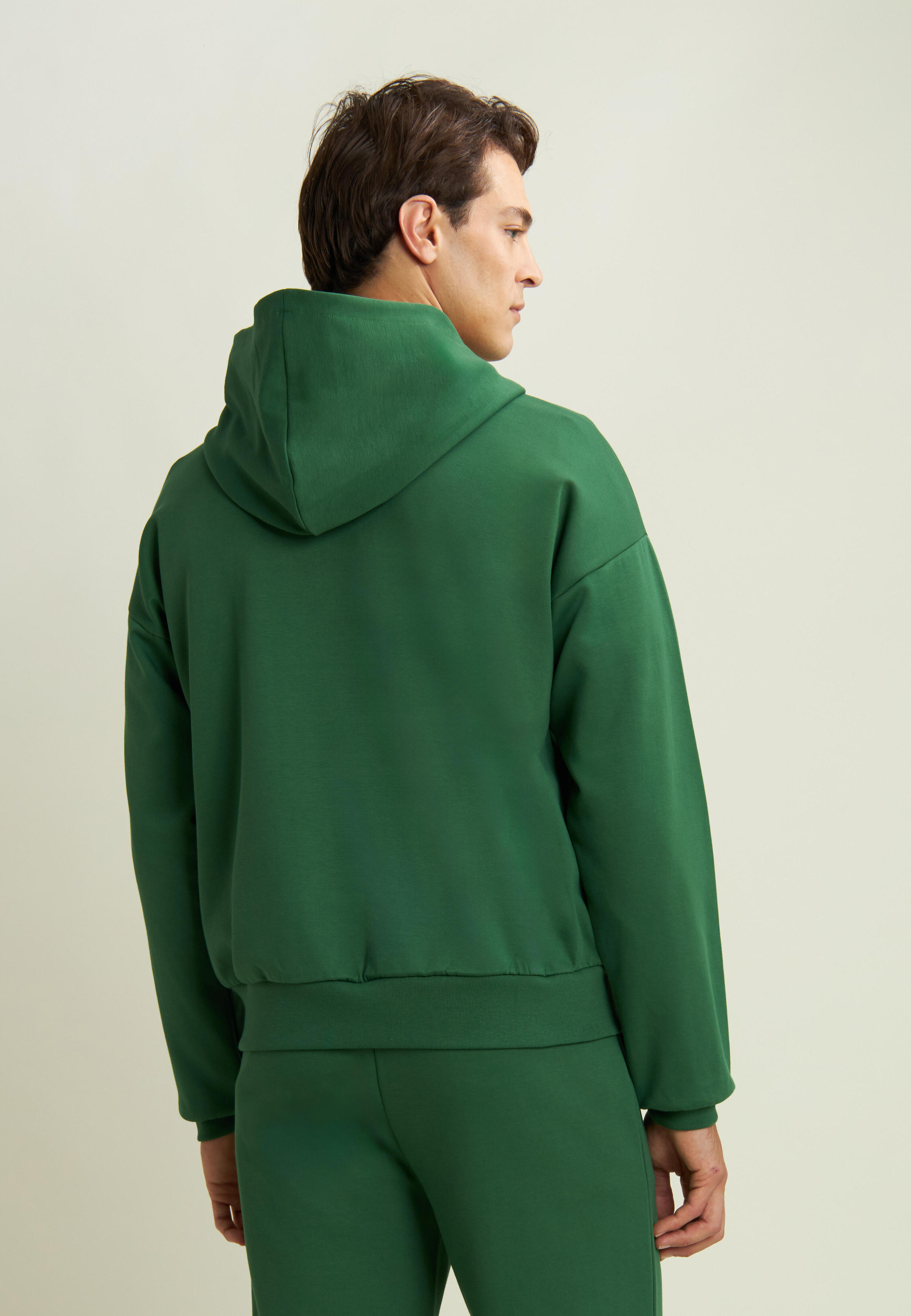 Sweat-shirt entièrement zippé avec capuche en jersey et poche zippée 3/4