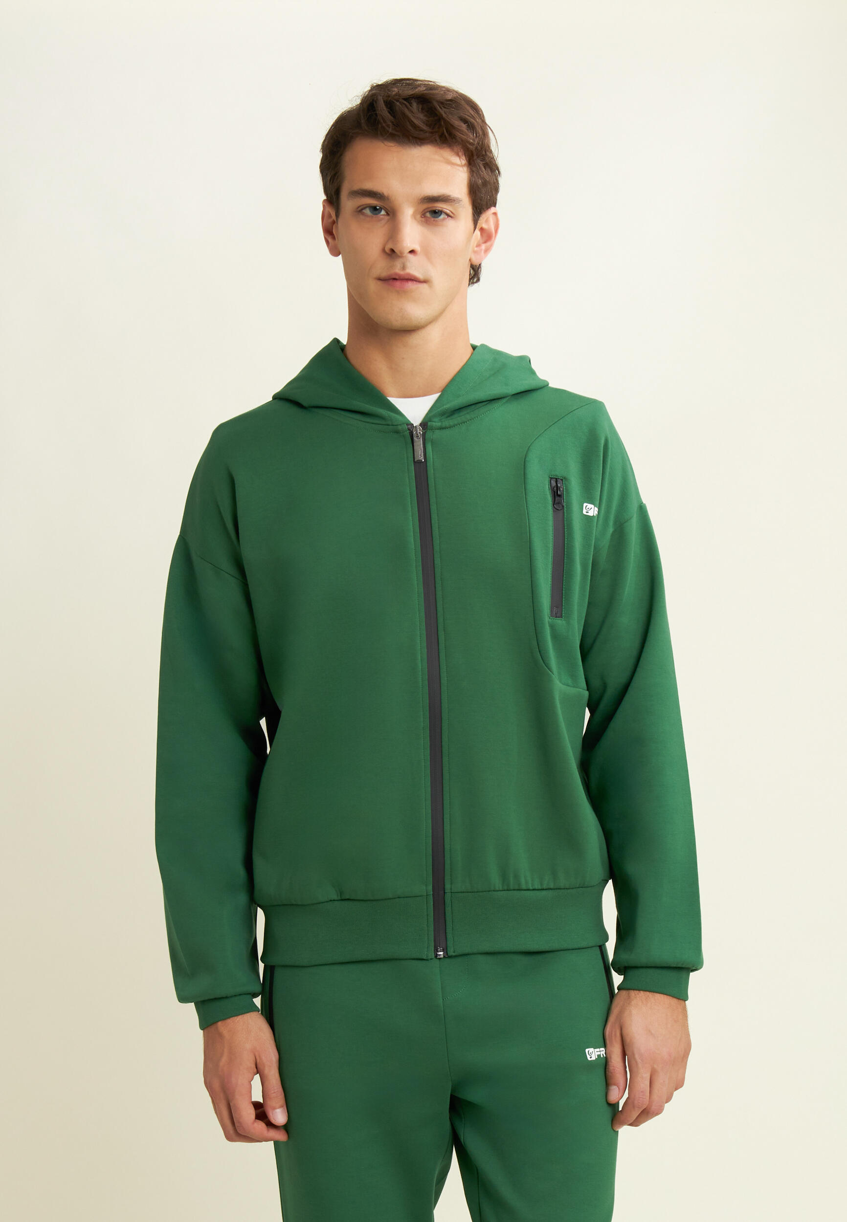 Sweat-shirt entièrement zippé avec capuche en jersey et poche zippée 2/4