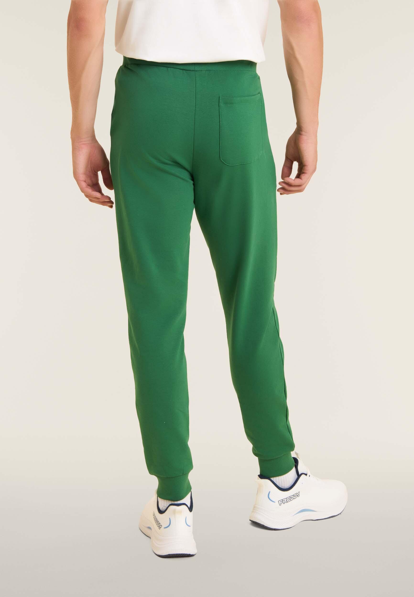 Pantalón slim en tejido interlock con maxilogotipo en relieve 3/4