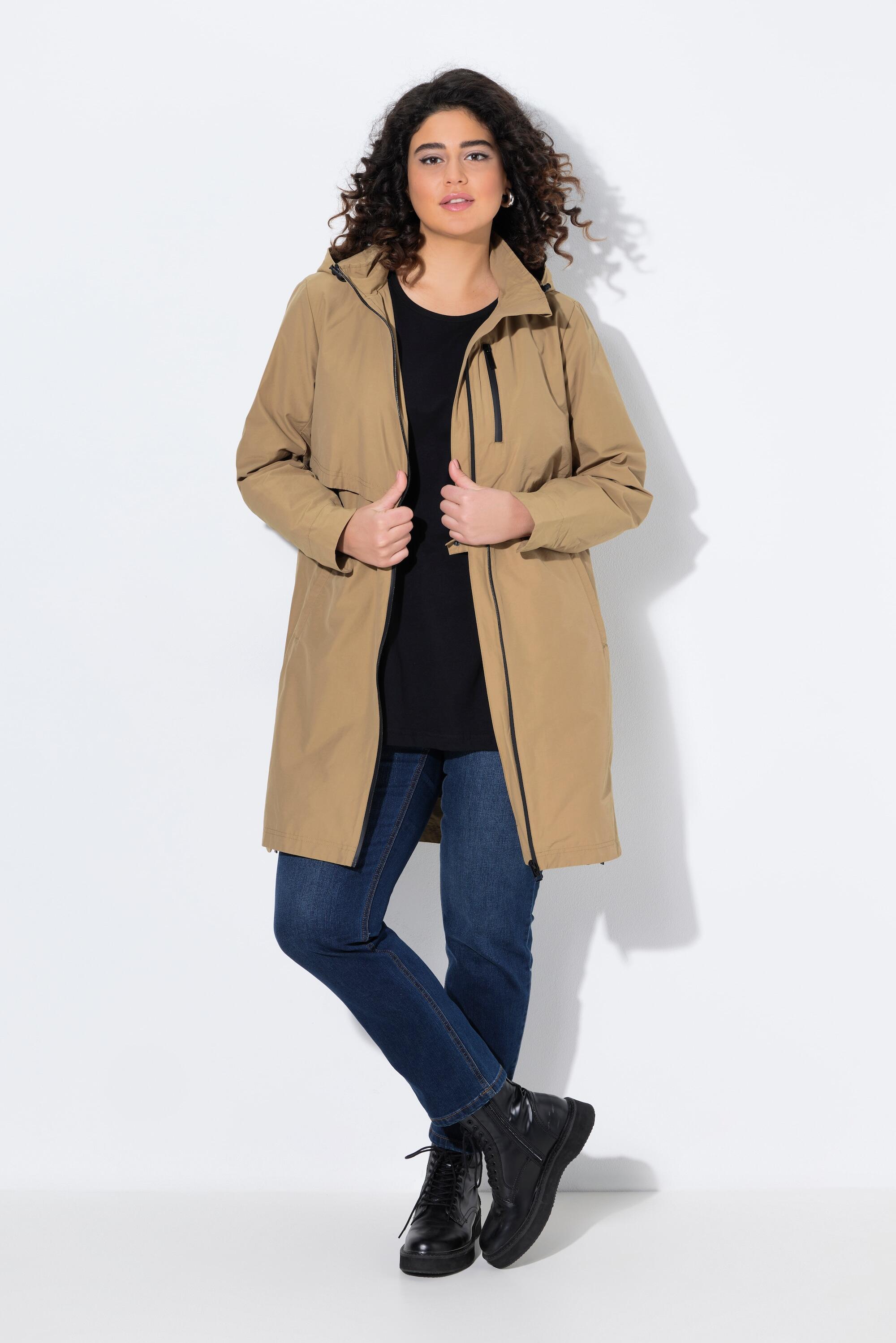 Femme Parka à capuche. Fentes latérales zippées. Poches zippées 6/7