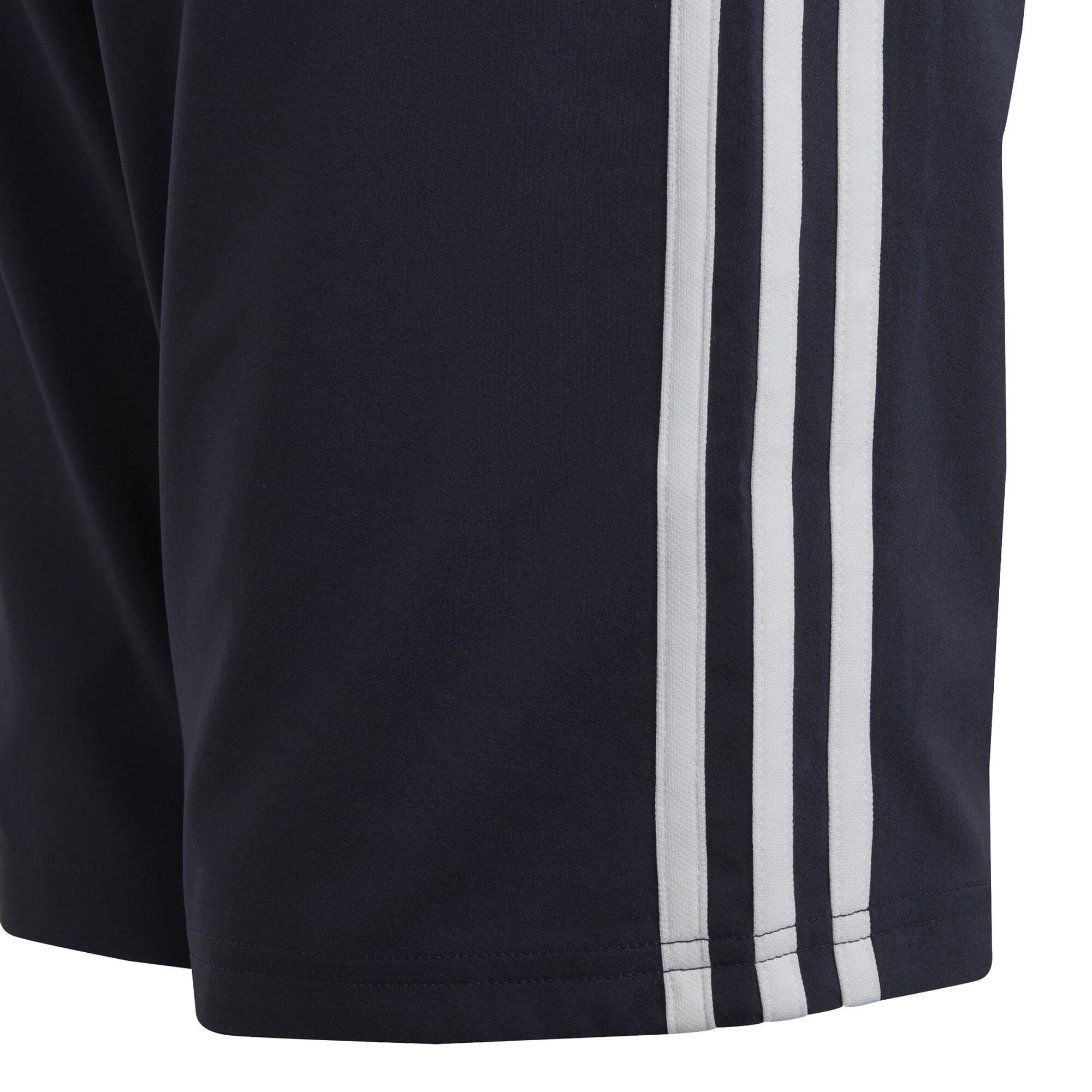 Shorts Adidas 3 bandes bleus. 5/7