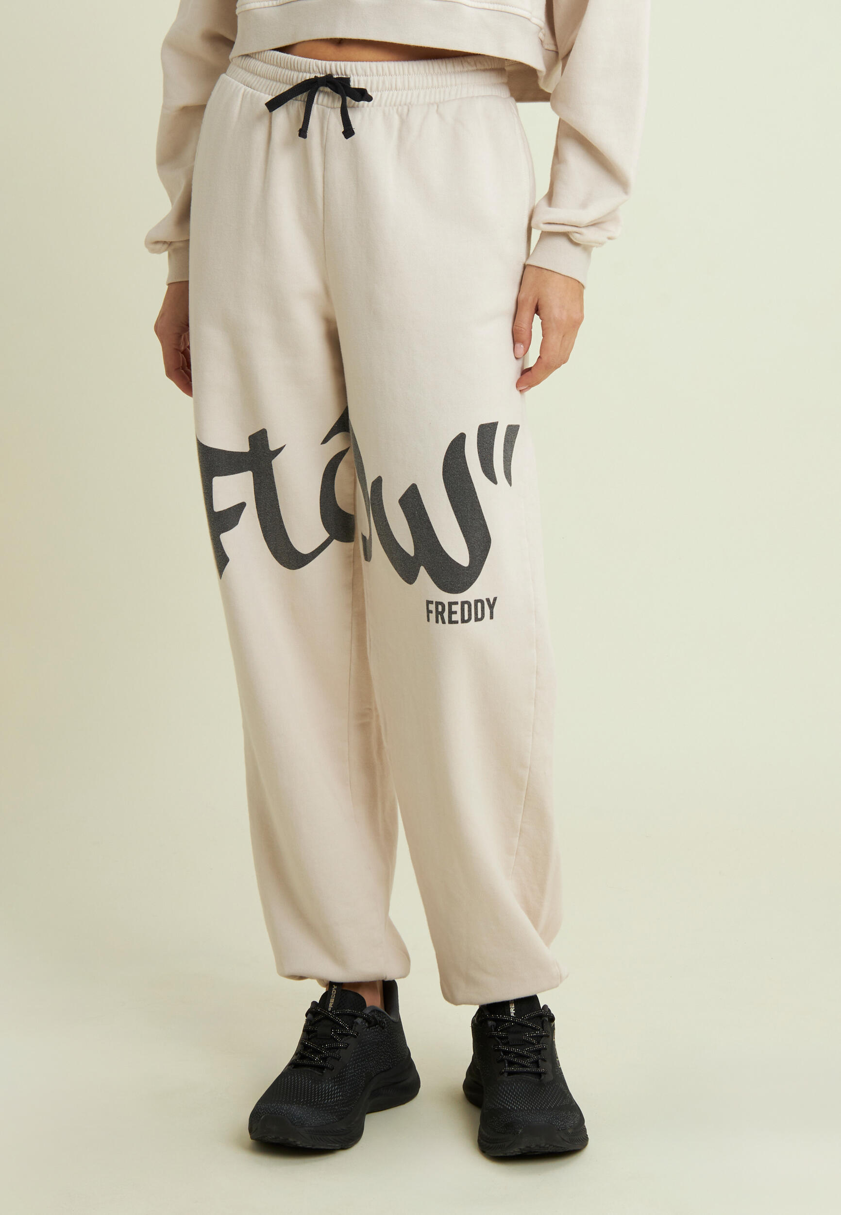 Pantalon en molleton avec imprimé « Flow » et bord froncé 2/4