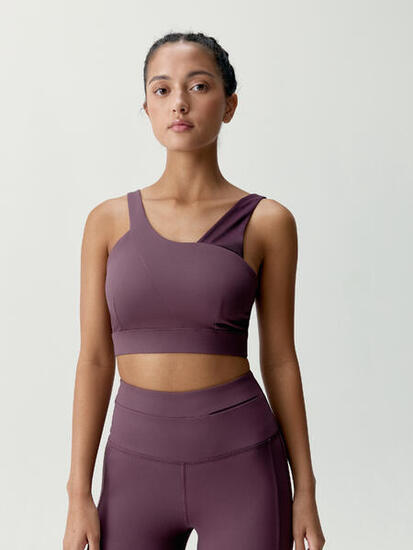 Haut de sport pour femme en tissu performant avec maintien moyen