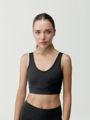 Top sportivo da donna Devi Sostegno Medio Performance
