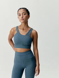 Haut de sport pour femme en tissu performant avec maintien moyen