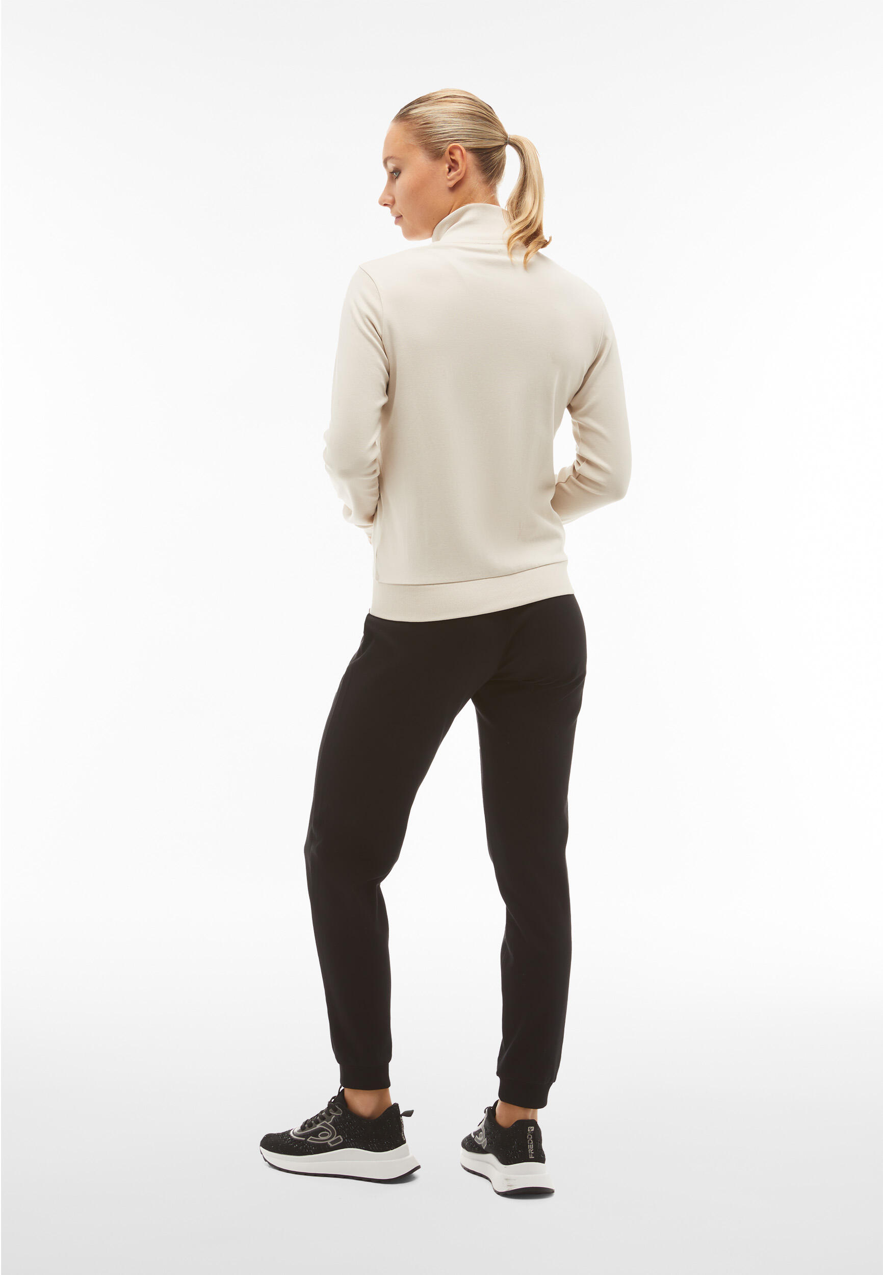 Tuta sportiva in interlock con felpa collo alto e zip 3/5