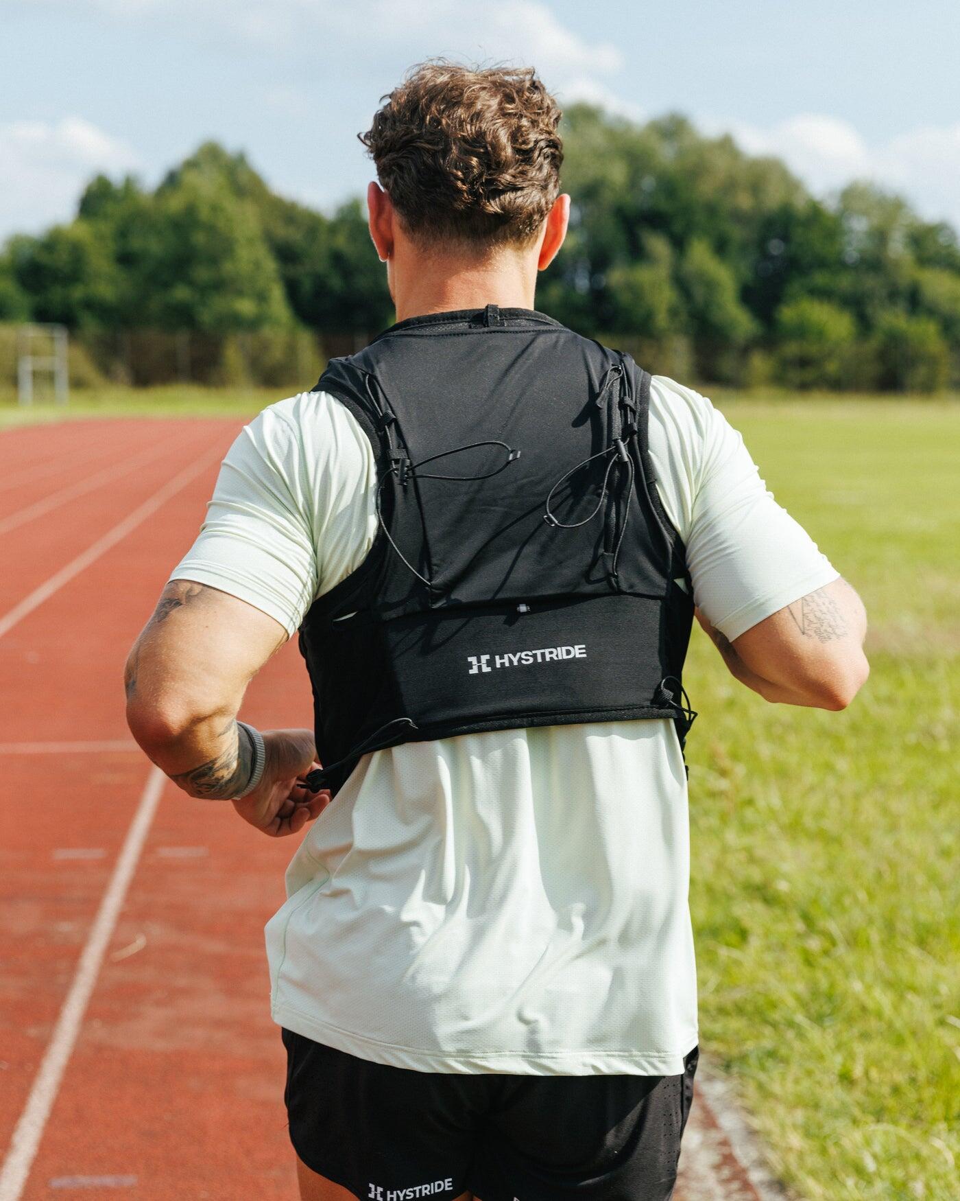 Gilet De Course Avec Bouteilles D'eau 700 Ml X2 – Ultra-léger, Réfléchissant, Réglable – Homme/femme