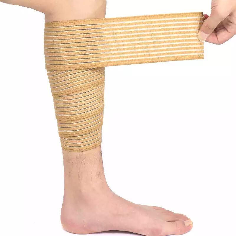 Fascia elastica con velcro per protezione e compressione del polpaccio 2/5