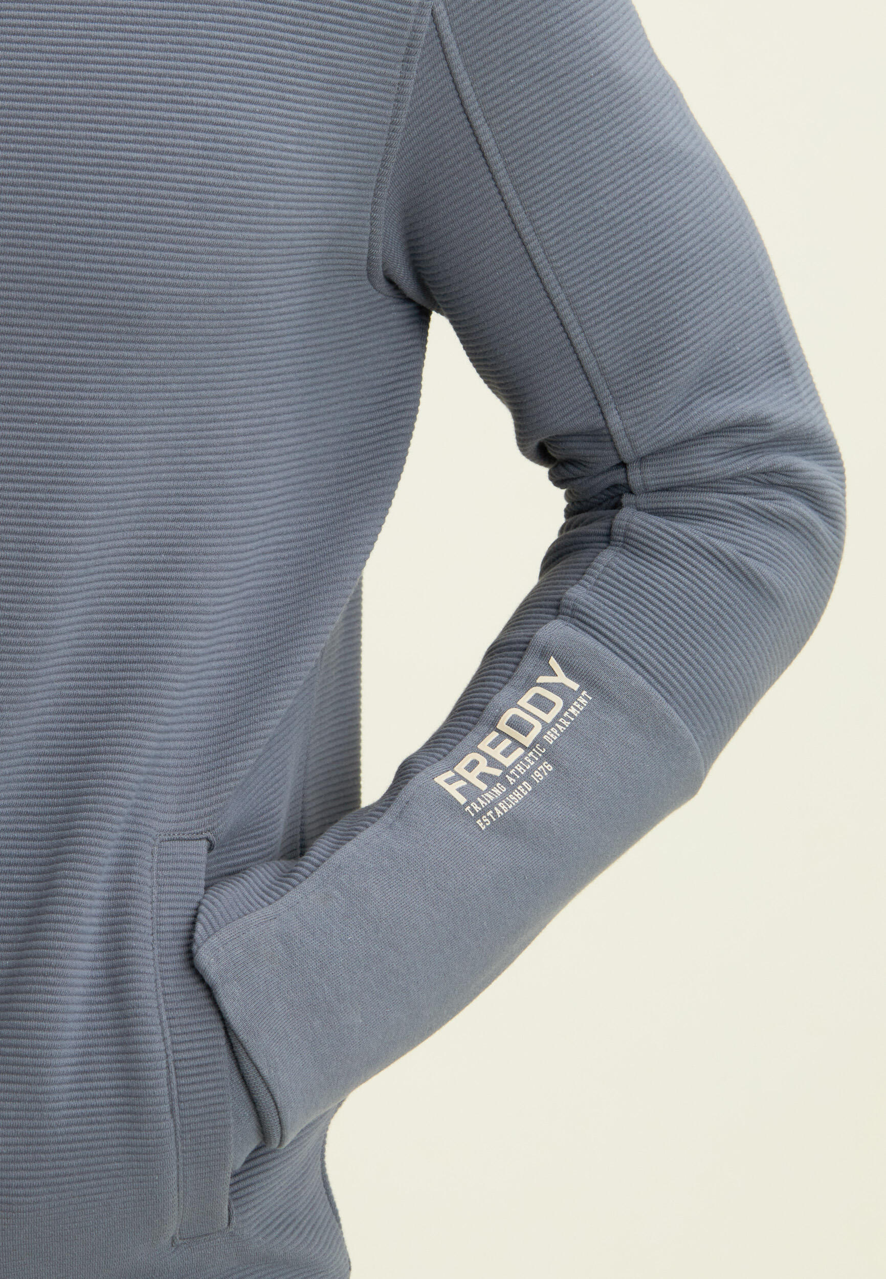 Sweat-shirt entièrement zippé rayé avec imprimé sur la manche 4/4