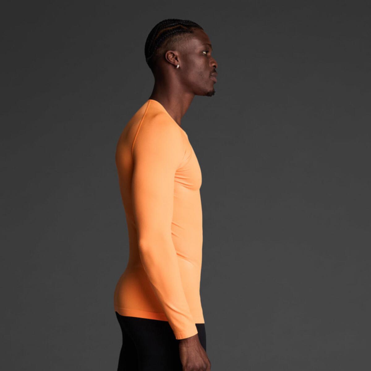 Camiseta térm. laranja fluo 4/6 7/7