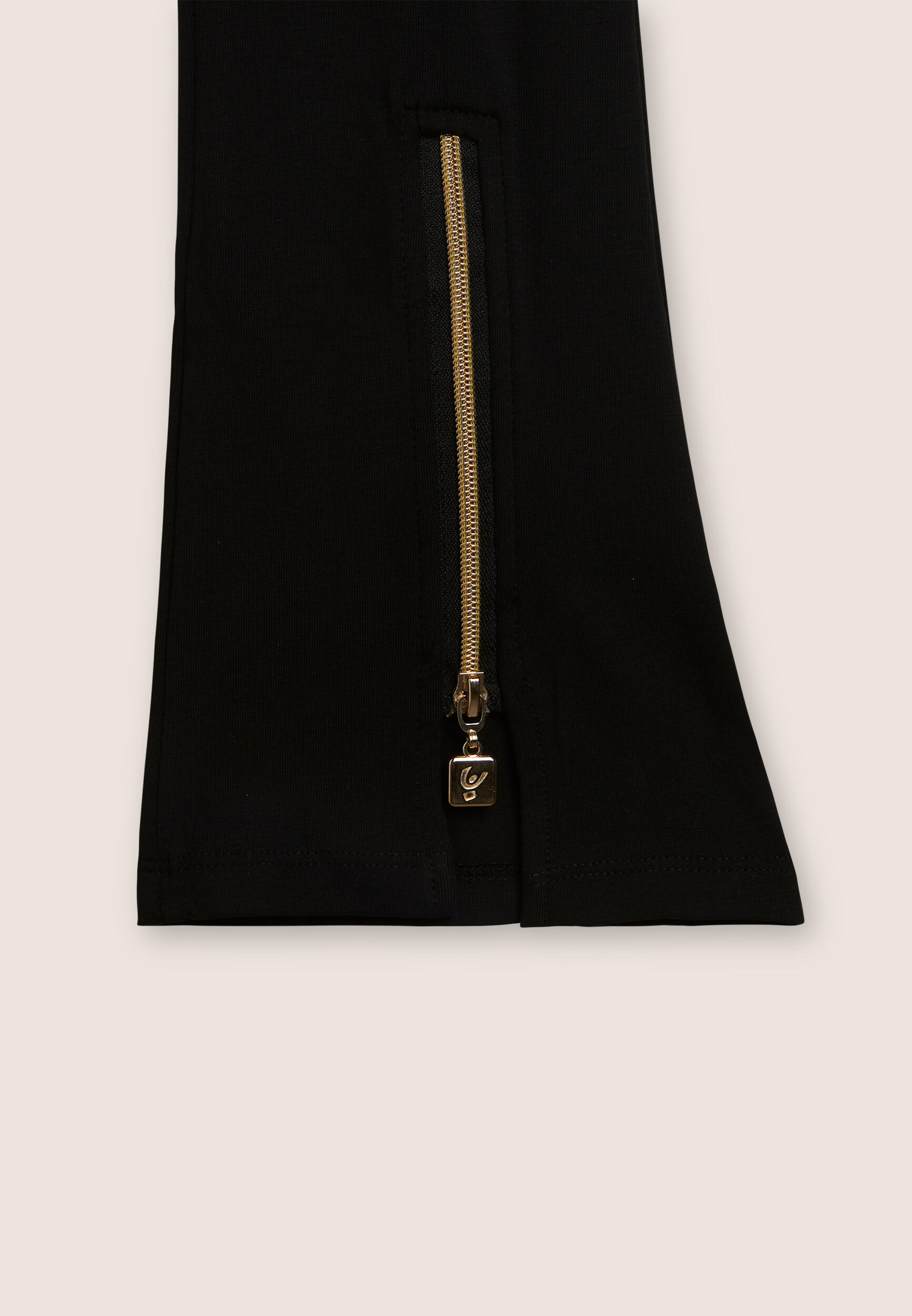 Pantaloni bambina flare con zip dorate sul fondo 3/3