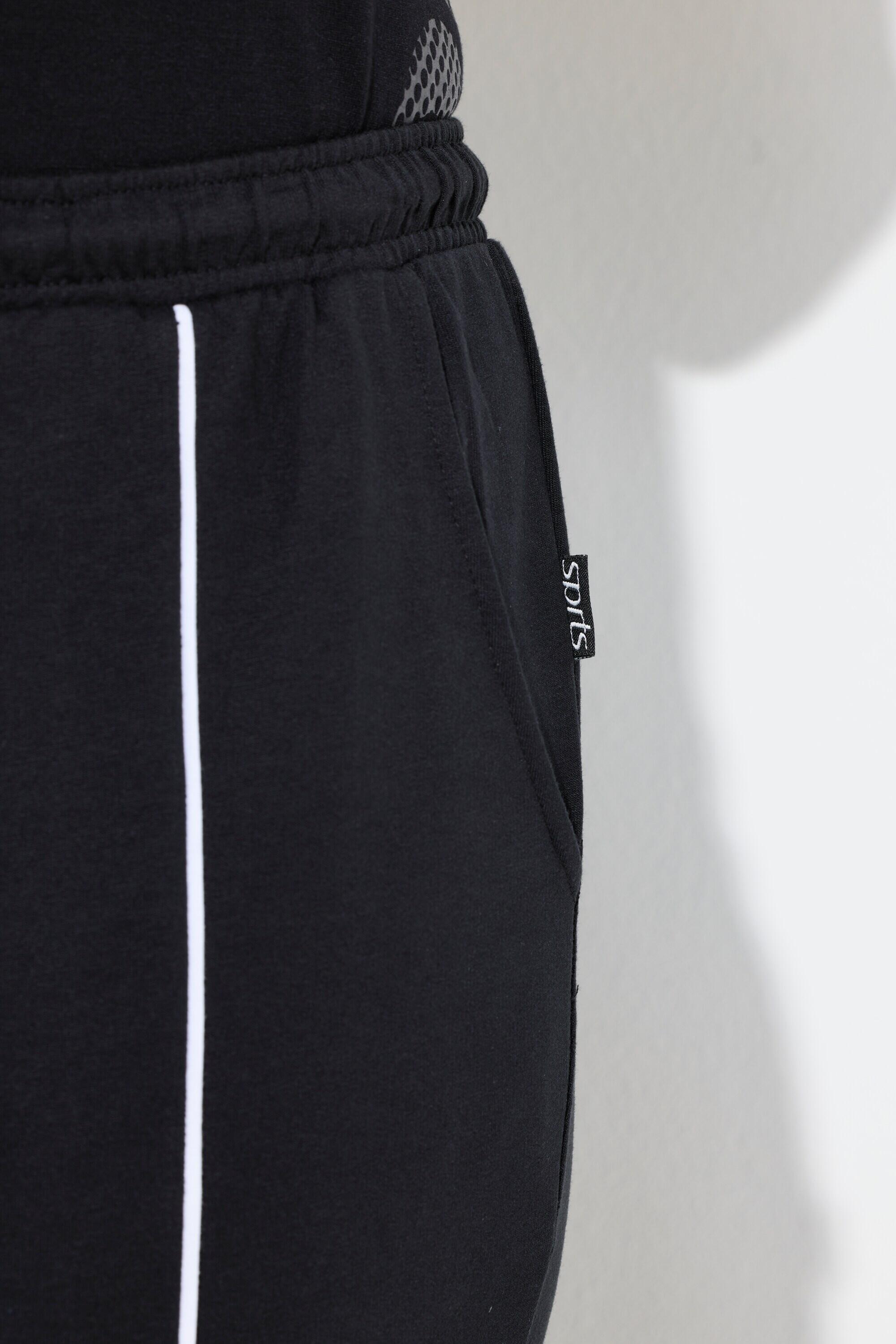Femme Pantalon de jogging avec passepoil jambe droite et taille élastique 3/7