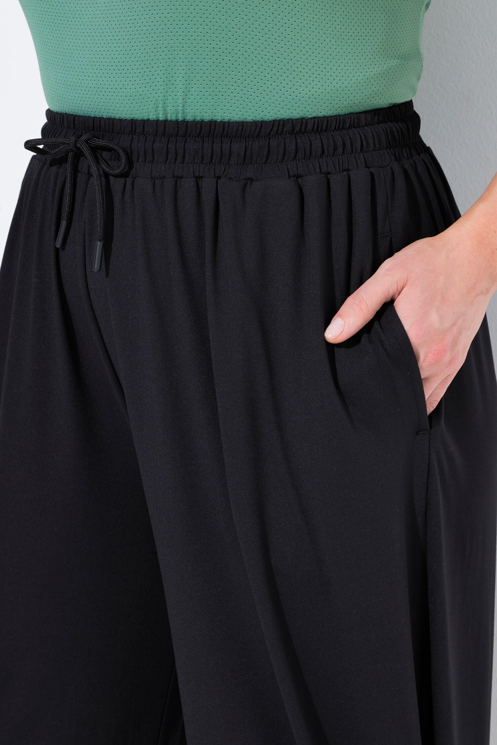 Femme Pantalon de jogging technique. Séchage rapide. Matière recyclée 4/7