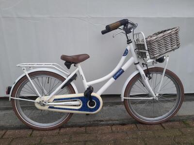 20 inch alpina cargo met een voordrager.