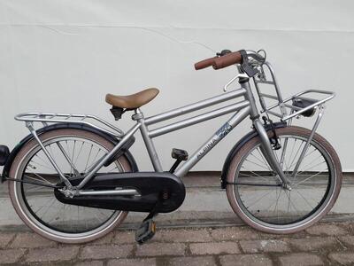 20 inch alpina cargo met terugtraprem en een voordrager.