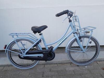 20 inch alpina cargo met terugtraprem en een voordrager.