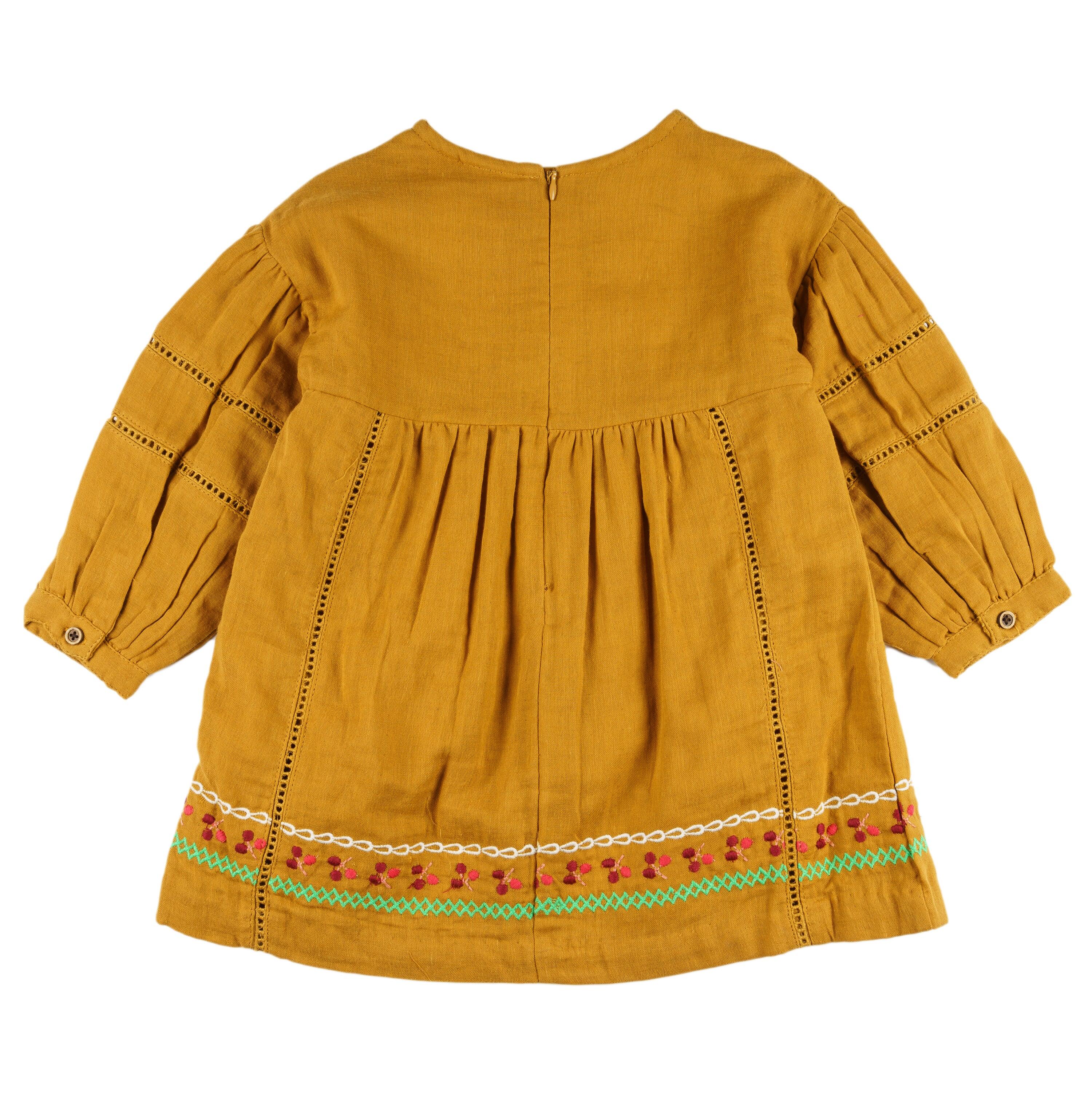 Vestido niña mostaza bambula bordado con borlas 2/4