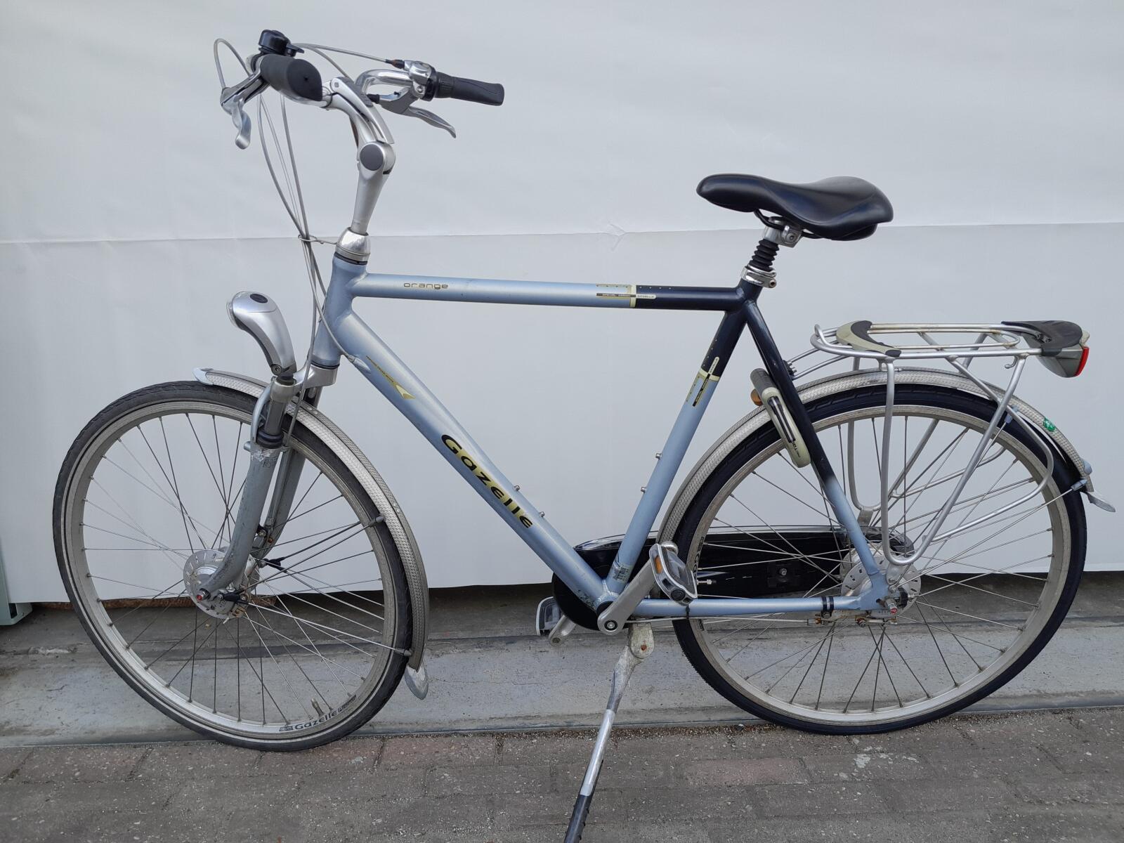 Gazelle stadsfiets 28" 7v, blauw-oranje, vering, dynamo 3/5