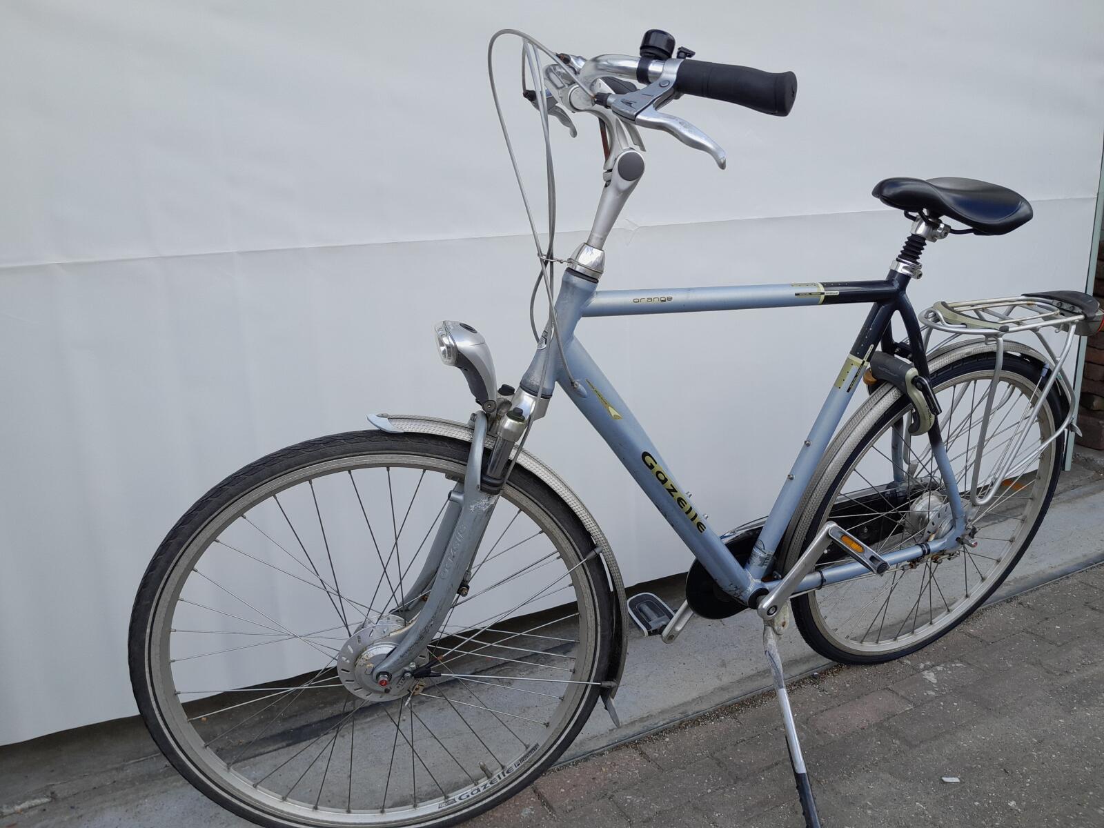 Gazelle stadsfiets 28" 7v, blauw-oranje, vering, dynamo 4/5