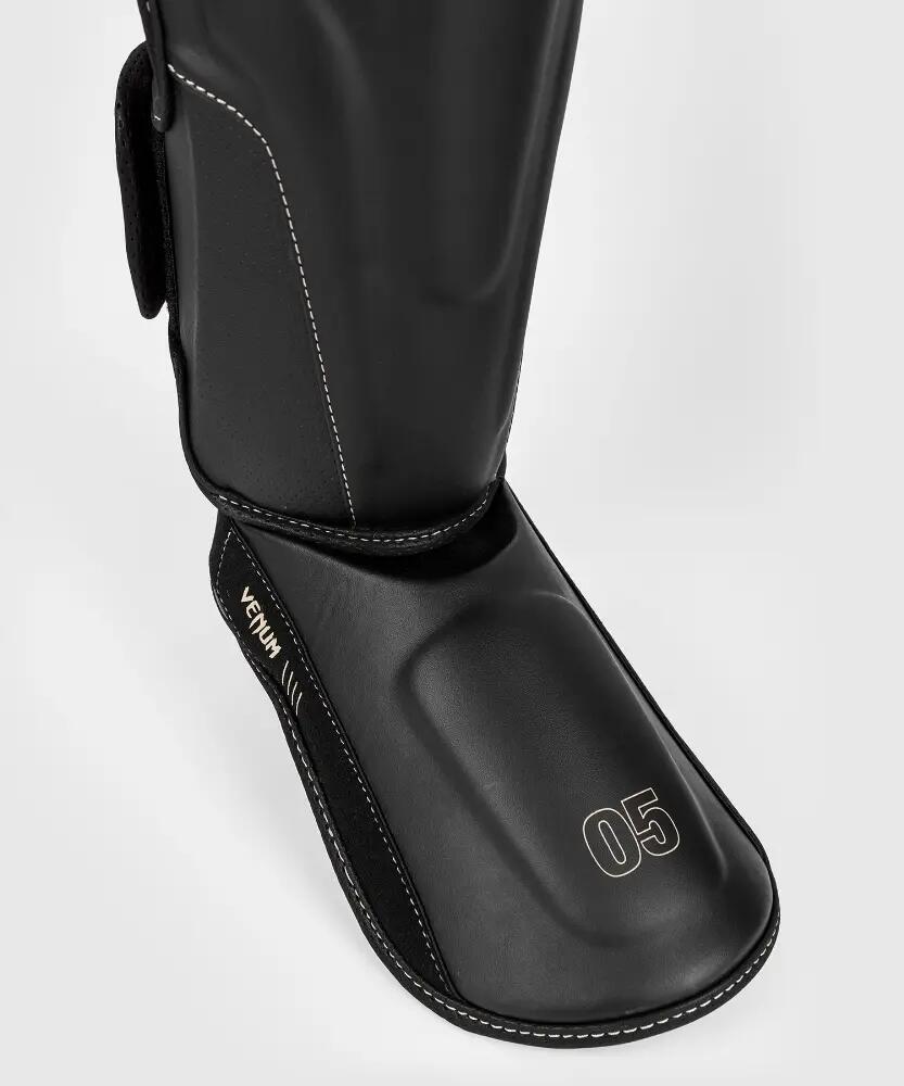 Protège-tibias Venum Impact Evo – Noir – XL 6/7