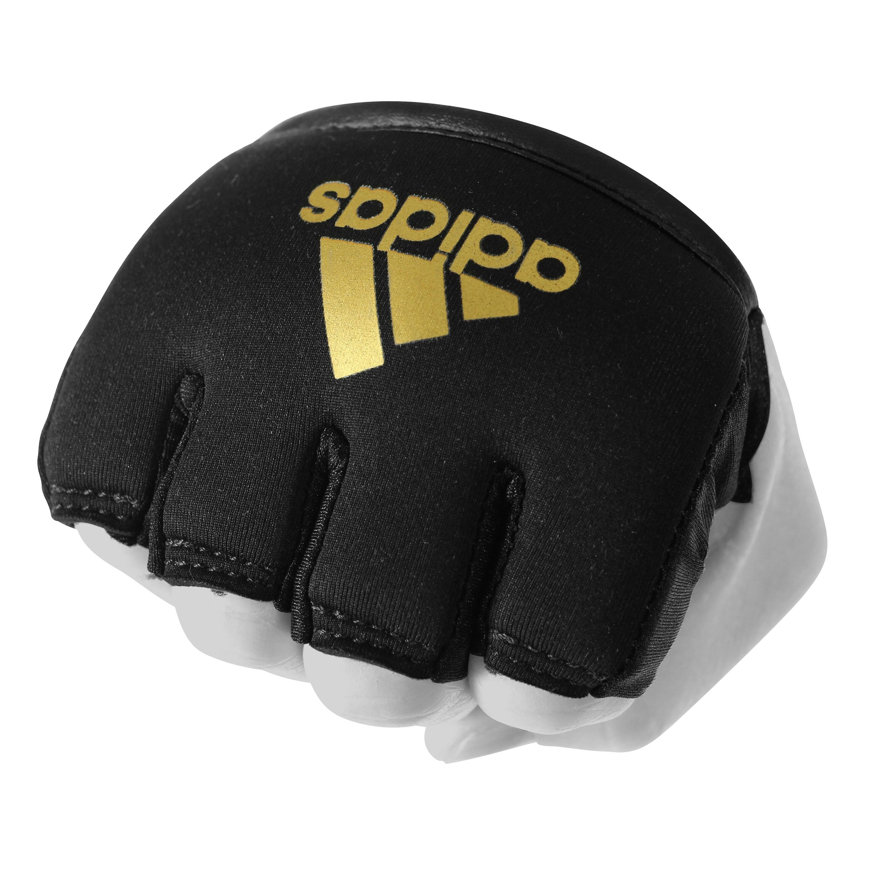 Protections métacarpes en gel  (couleur : noir/or) 2/3