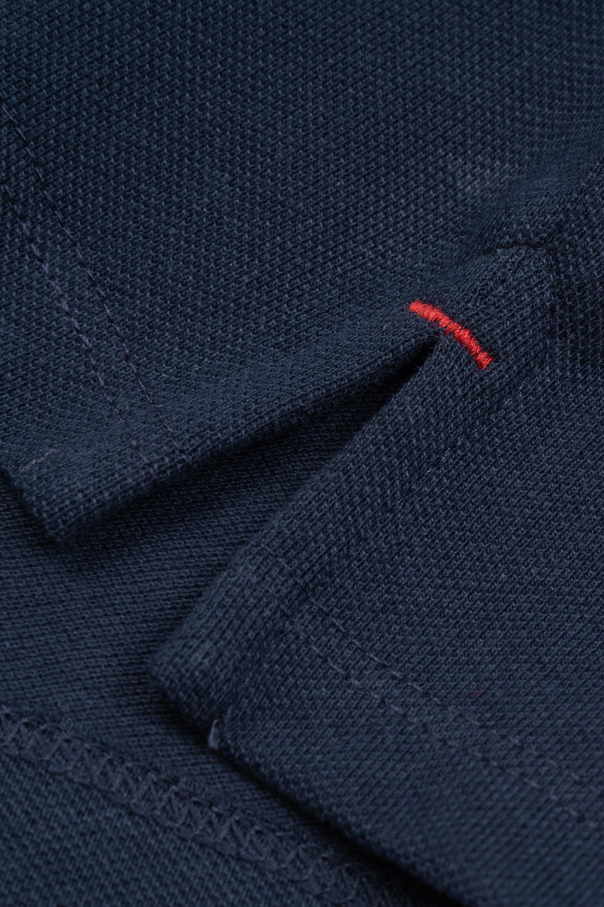 Polo manga larga de niño marino detalle cuello 4/5